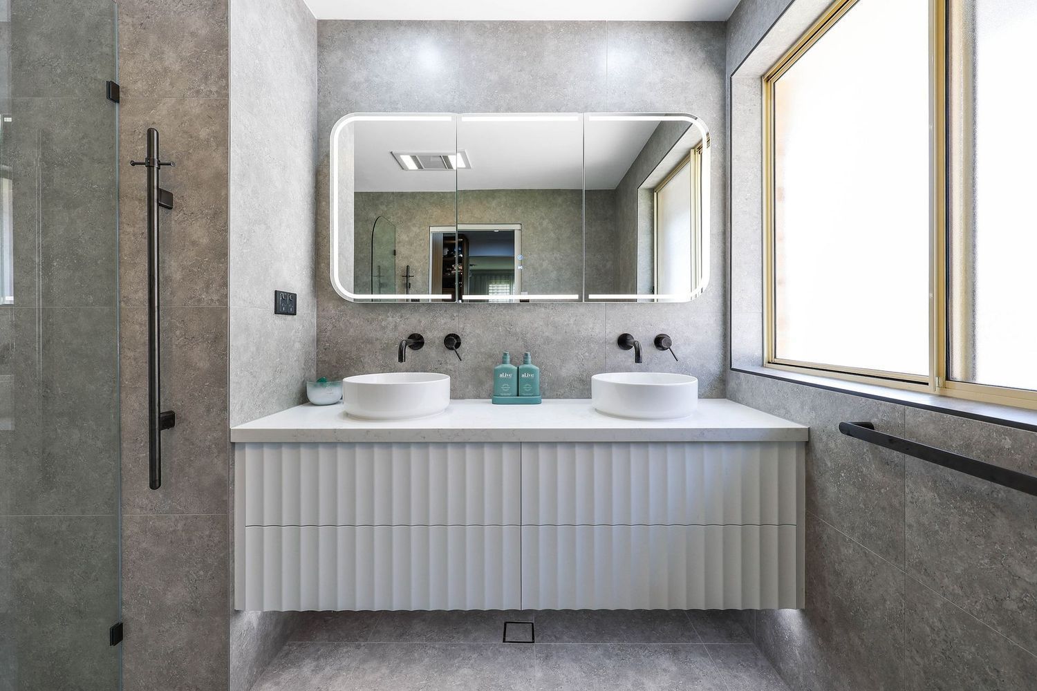 Modern Bathroom With Double Sinks, Large Mirror — Above & Beyond Interiors in Smeaton Grange, NSW