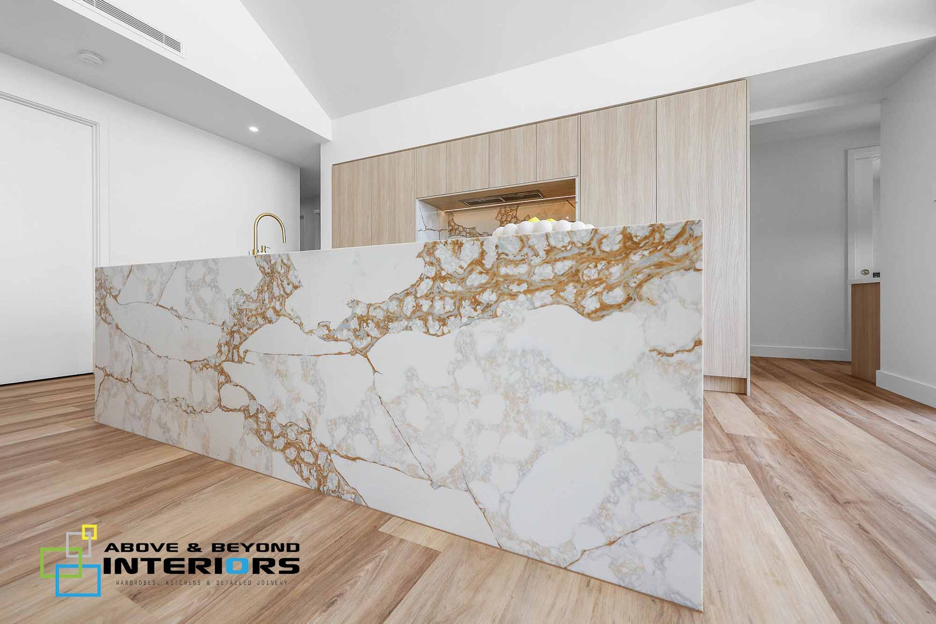 Modern Lobby with White Marble Reception Desk — Above & Beyond Interiors in Smeaton Grange, NSW