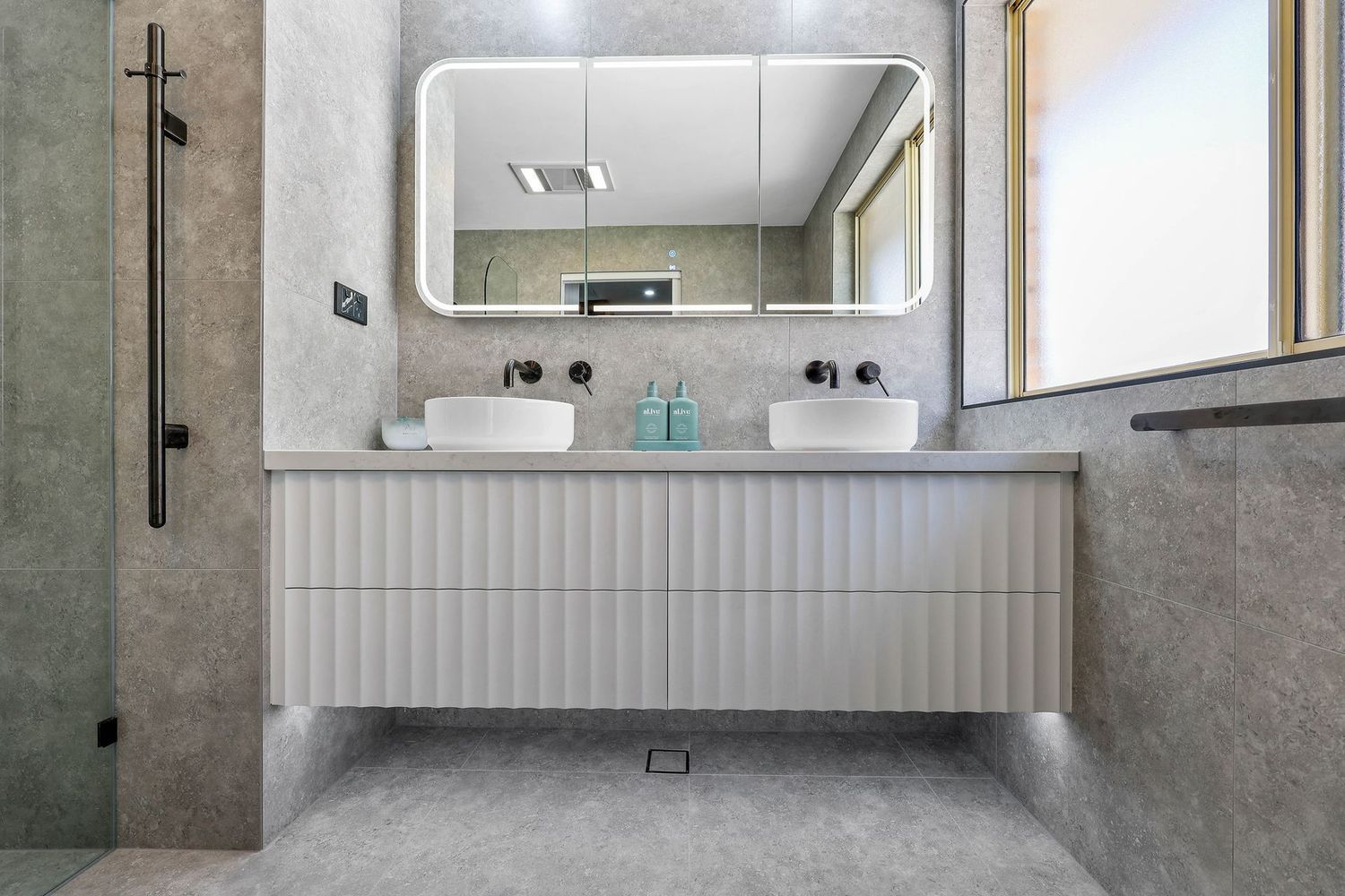 Modern Bathroom With Double Sink Vanity — Above & Beyond Interiors in Smeaton Grange, NSW