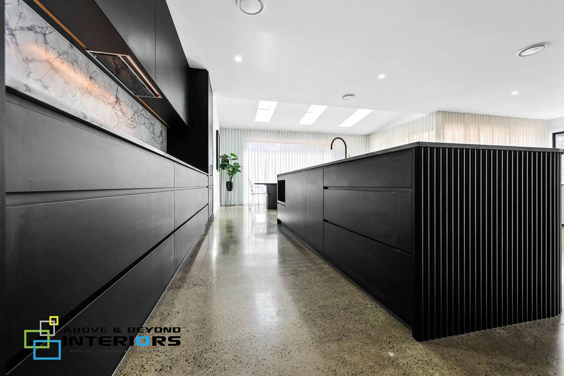 Modern Office Reception Area with Black Counters — Above & Beyond Interiors in Smeaton Grange, NSW