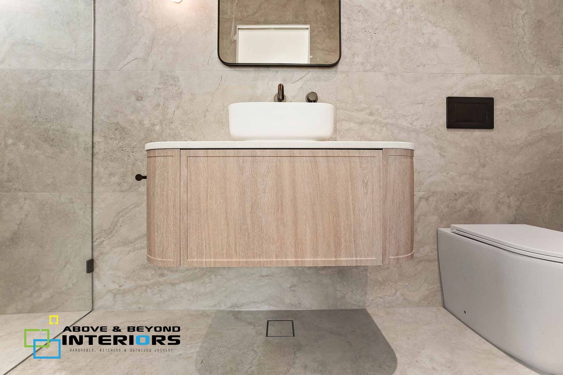 Modern Bathroom With Floating Wood Vanity — Above & Beyond Interiors in Smeaton Grange, NSW