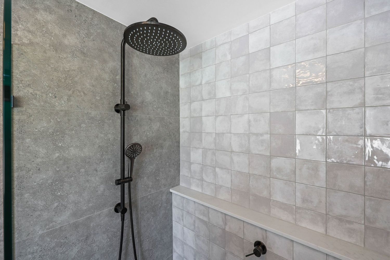 Modern Bathroom Shower With Black Rainfall Showerhead — Above & Beyond Interiors in Smeaton Grange, NSW