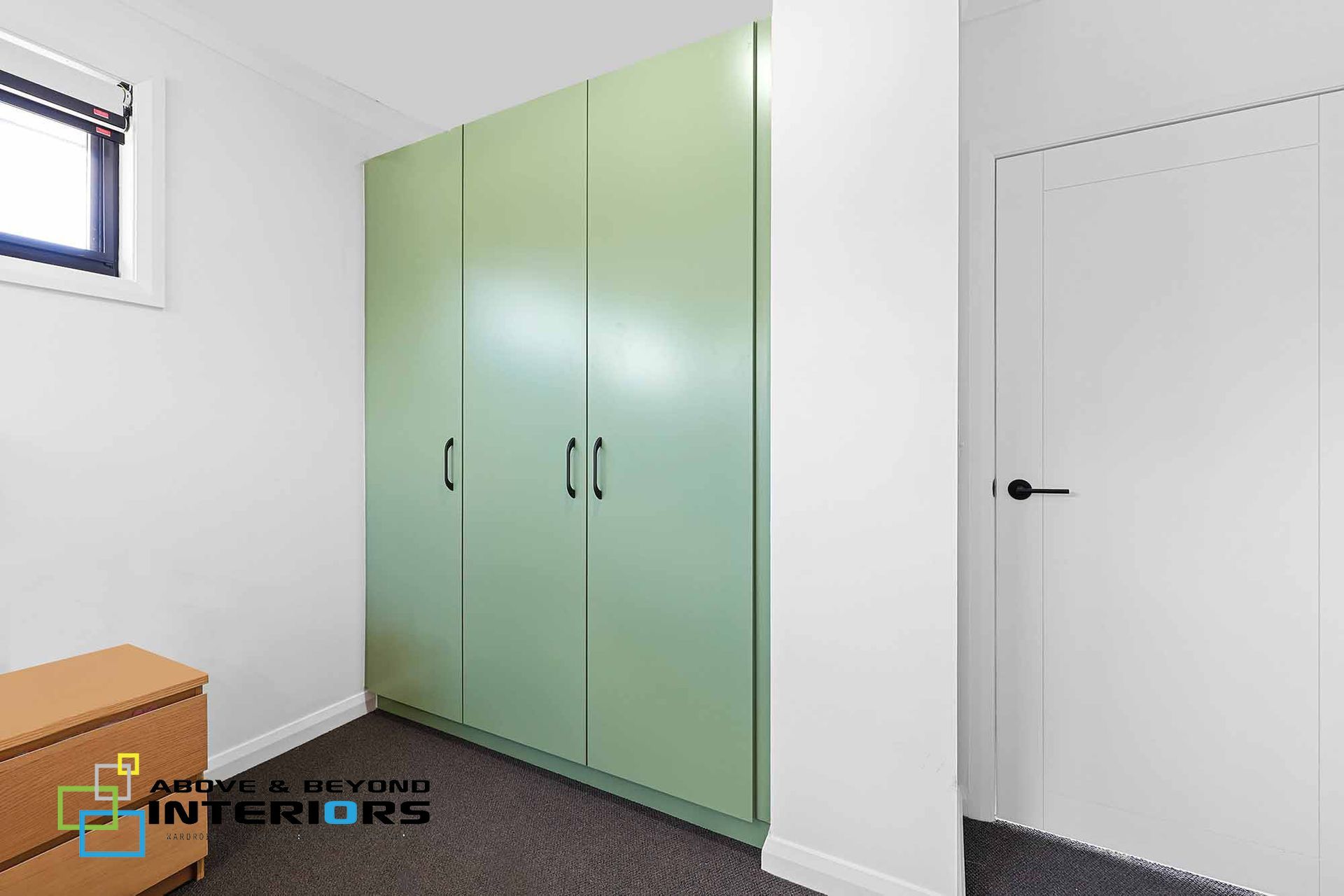 Small White Room with Green Built-In Cabinets — Above & Beyond Interiors in Smeaton Grange, NSW
