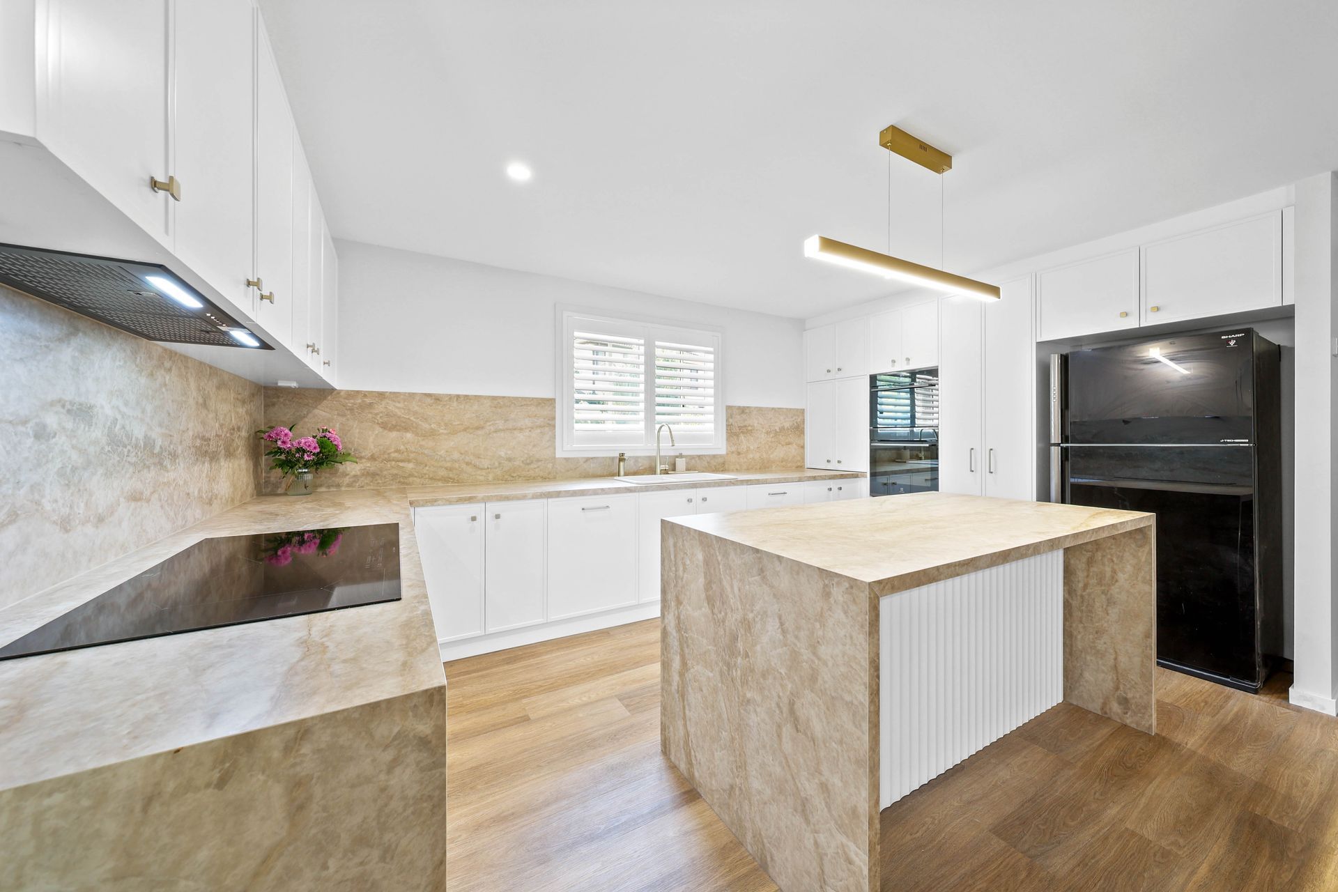Bright Modern Kitchen With White Cabinets — Above & Beyond Interiors in Smeaton Grange, NSW