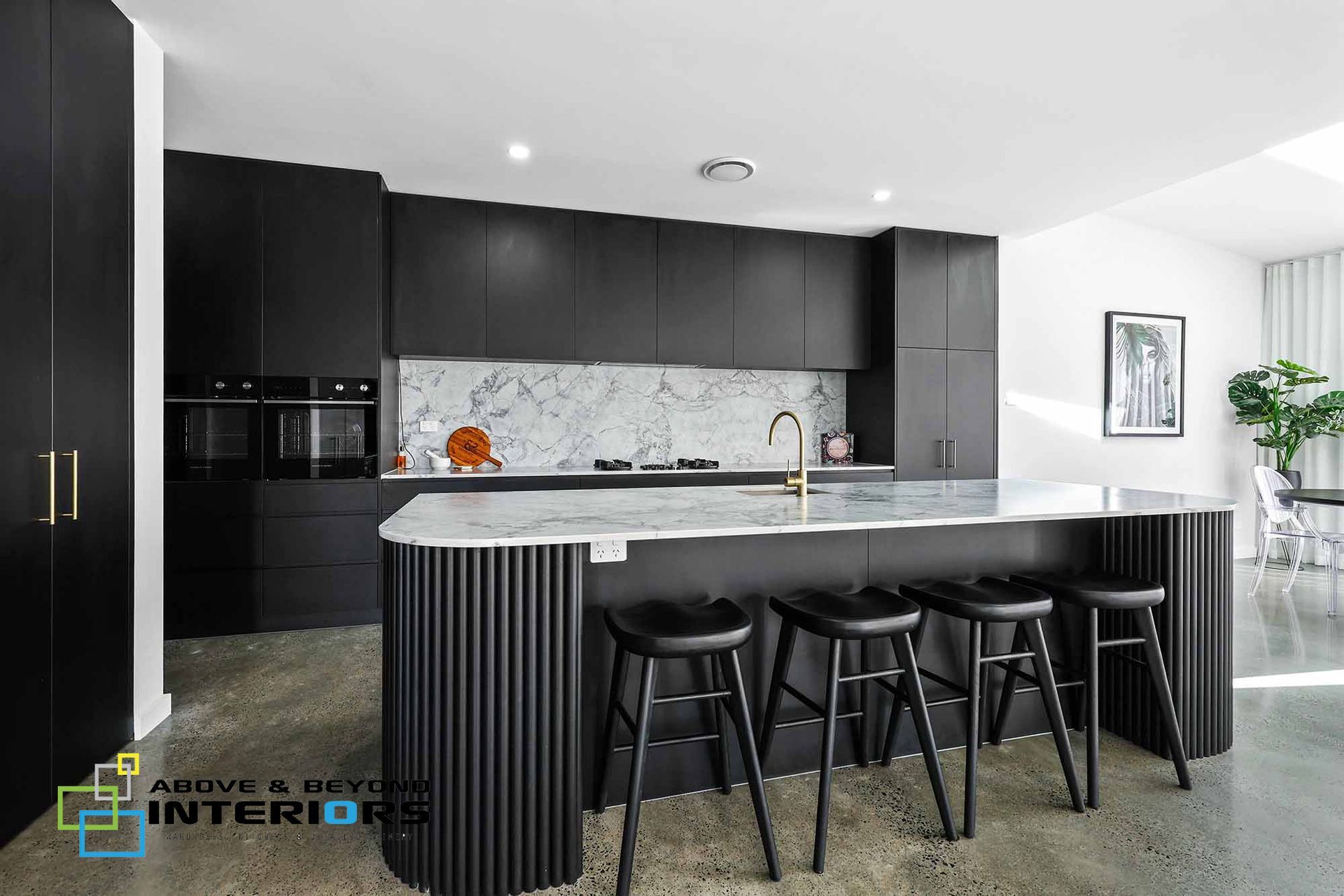 Modern Black-And-White Kitchen with Island — Above & Beyond Interiors in Smeaton Grange, NSW