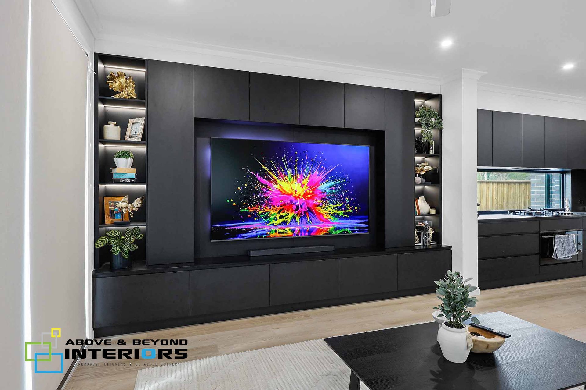 Modern Living Room with A Wall-Mounted Tv — Above & Beyond Interiors in Smeaton Grange, NSW