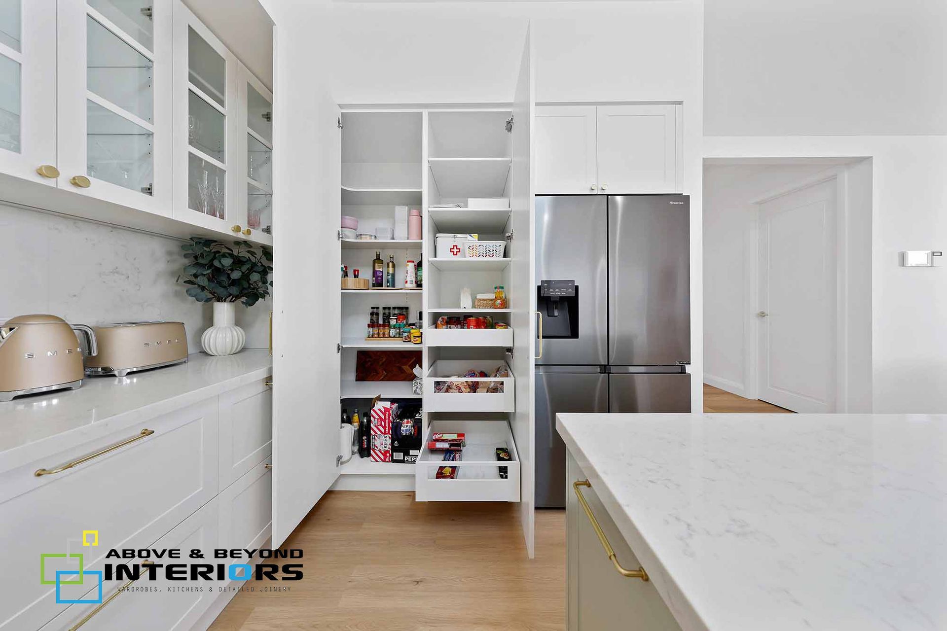 Bright Modern Kitchen with White Cabinets — Above & Beyond Interiors in Smeaton Grange, NSW