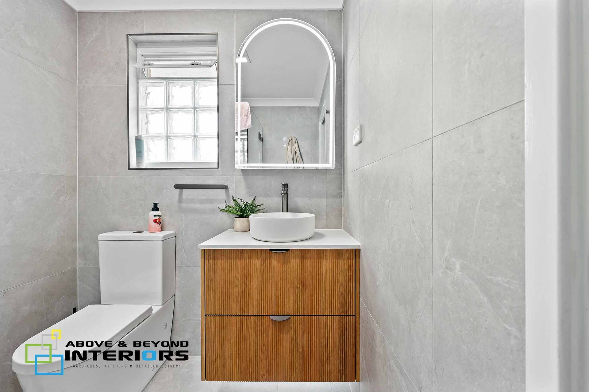 Modern Bathroom with Wood Vanity — Above & Beyond Interiors in Smeaton Grange, NSW