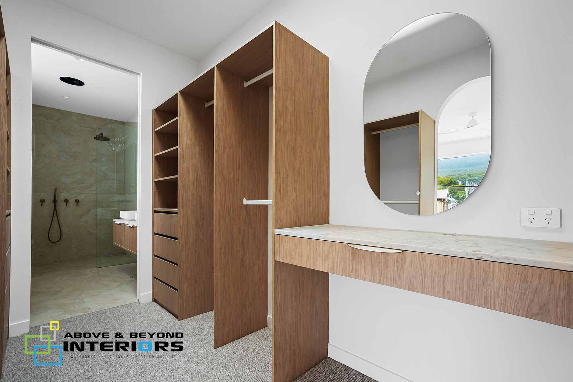 Modern Bathroom with Wood Vanity, and Oval Mirror — Above & Beyond Interiors in Smeaton Grange, NSW