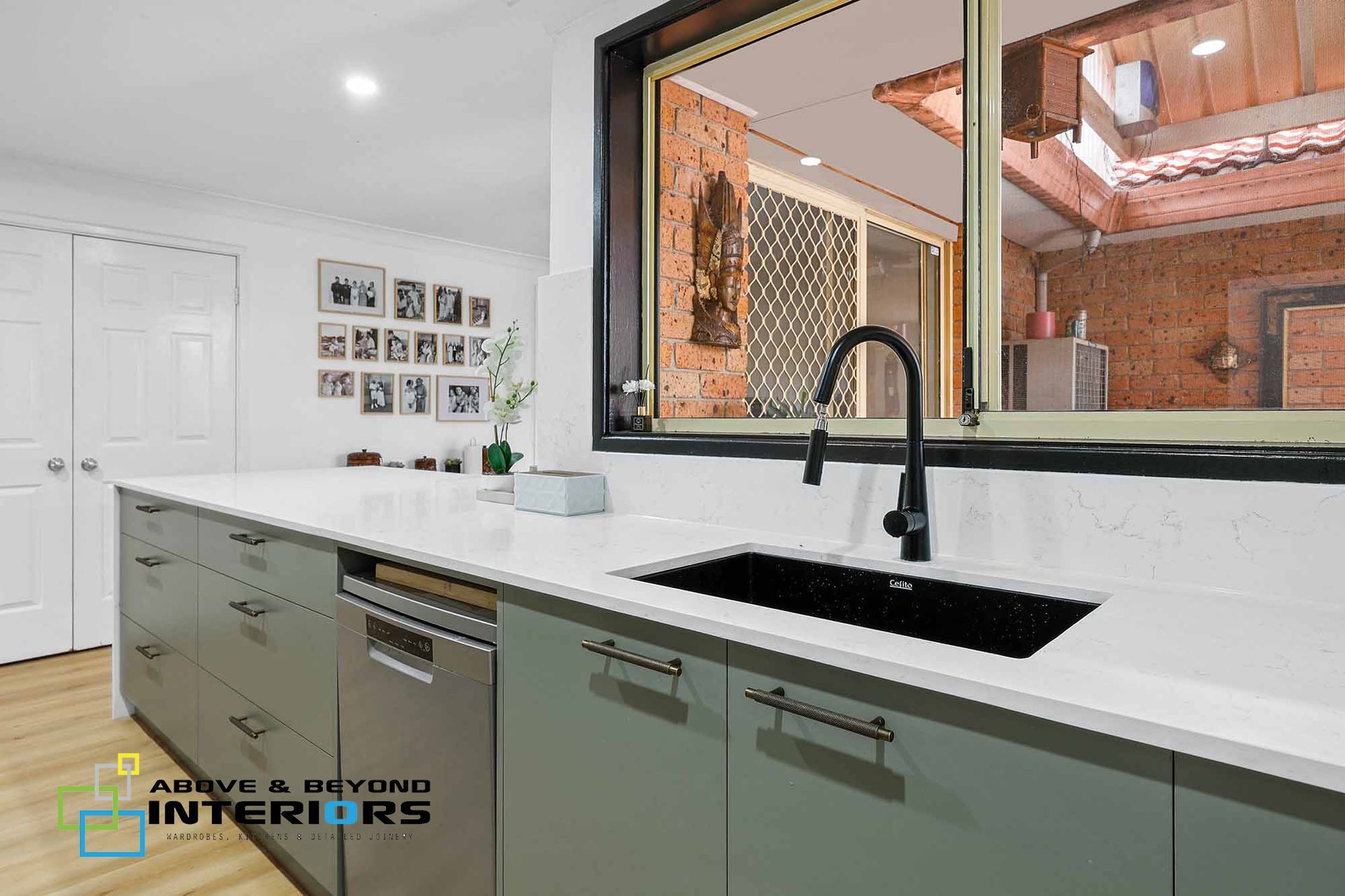 A Kitchen with White Countertops — Above & Beyond Interiors in Smeaton Grange, NSW