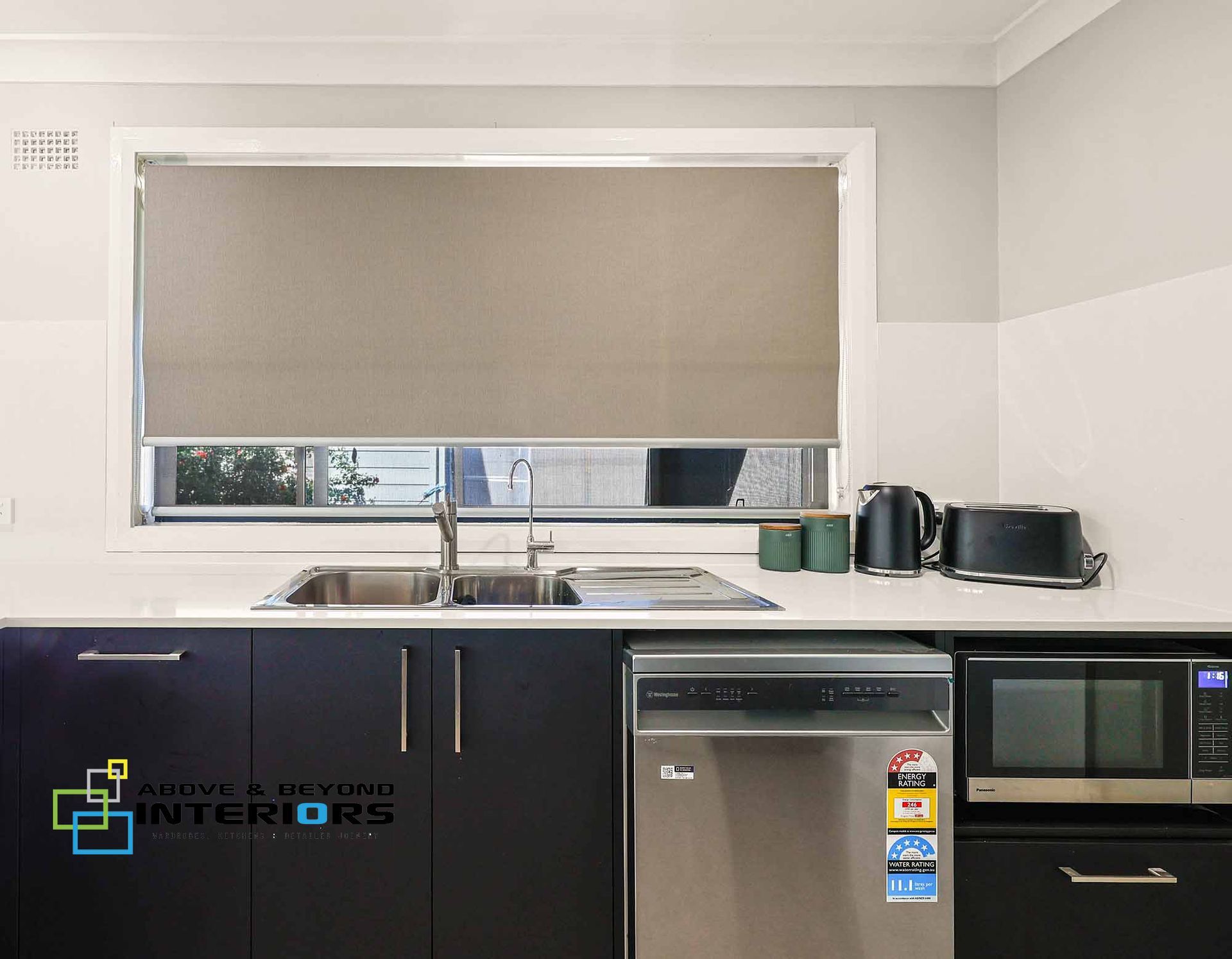 Modern Kitchen with Beige Blinds — Above & Beyond Interiors in Smeaton Grange, NSW