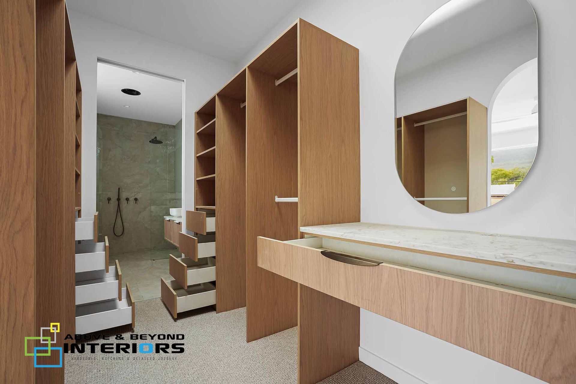 Modern Walk-In Closet with Wood Shelving — Above & Beyond Interiors in Smeaton Grange, NSW