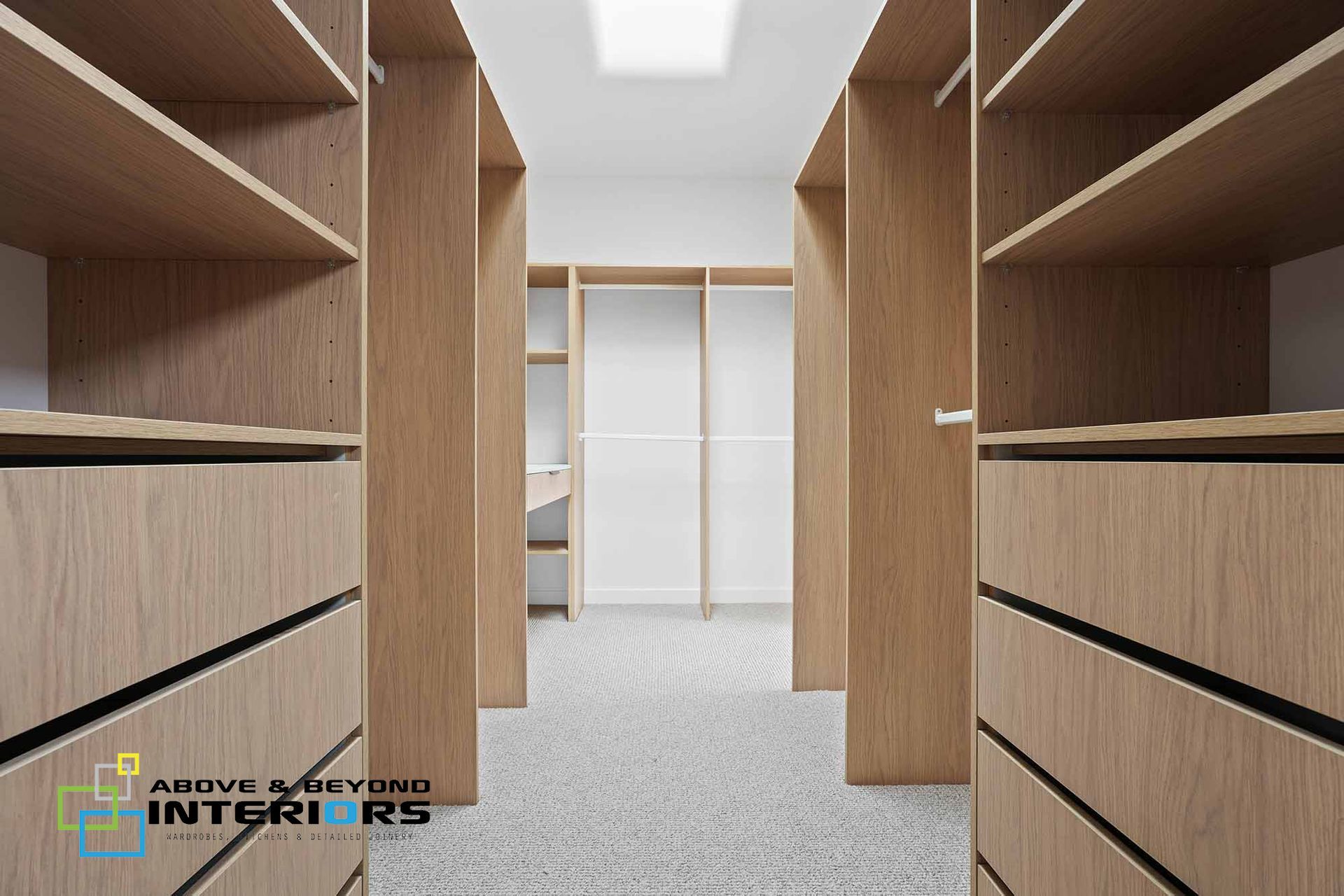 Empty Modern Office Storage Aisle with Wooden Shelving — Above & Beyond Interiors in Smeaton Grange, NSW