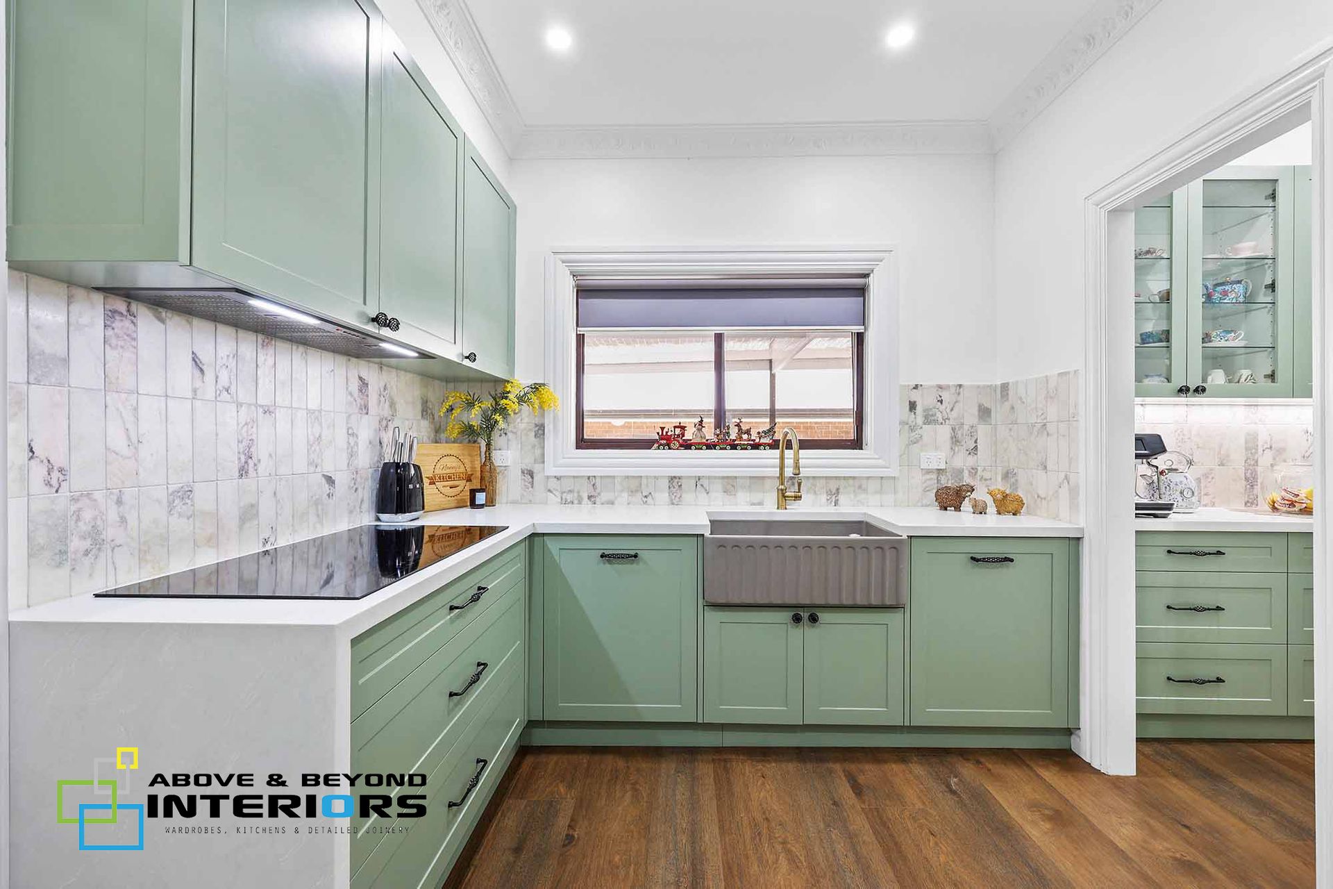 Mint Green Kitchen with White Marble Counters — Above & Beyond Interiors in Smeaton Grange, NSW