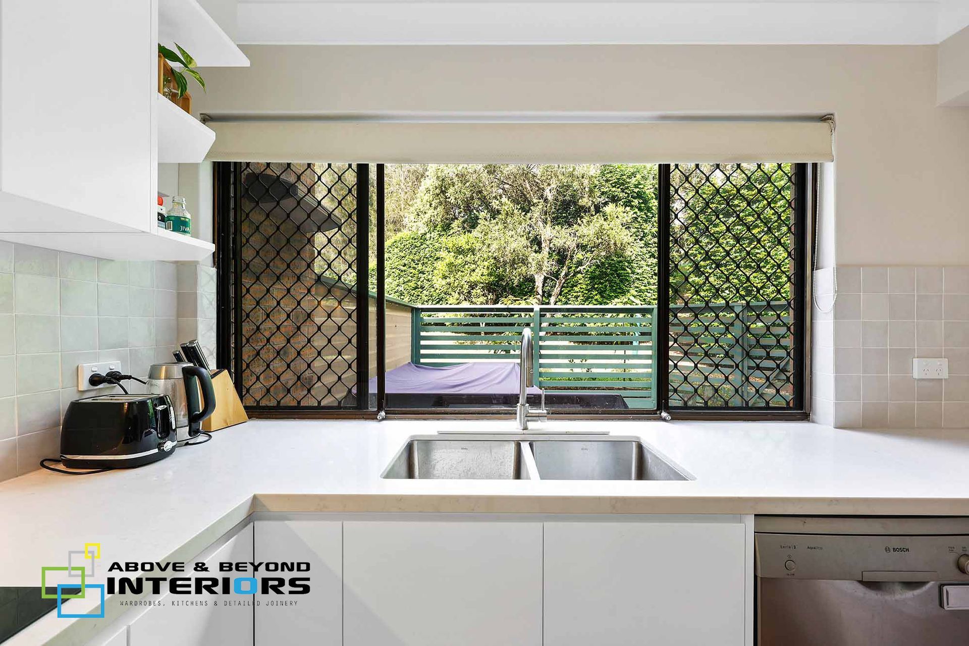 Bright Kitchen with White Counters — Above & Beyond Interiors in Smeaton Grange, NSW