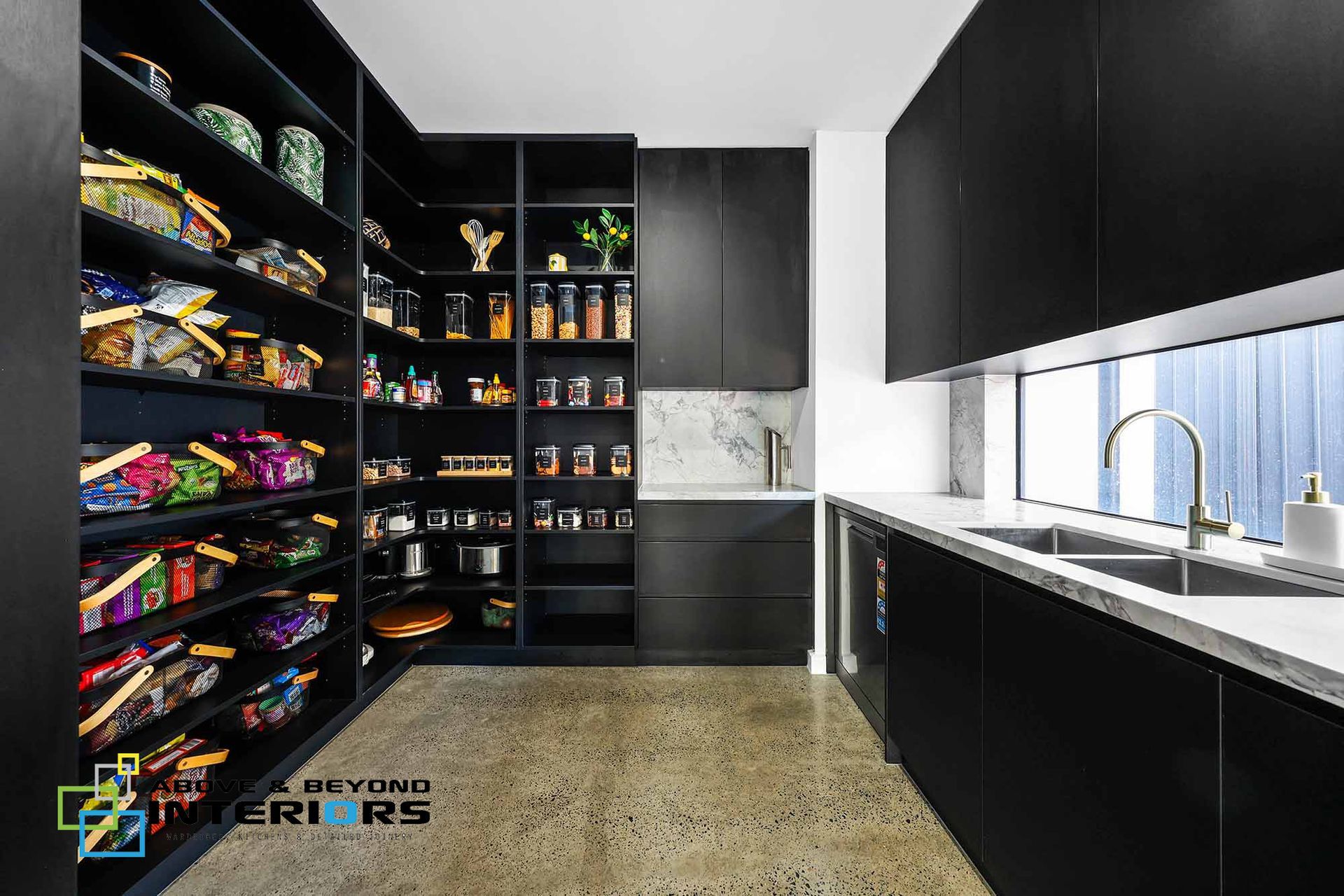 Modern Black Kitchen with Open Pantry Shelves — Above & Beyond Interiors in Smeaton Grange, NSW