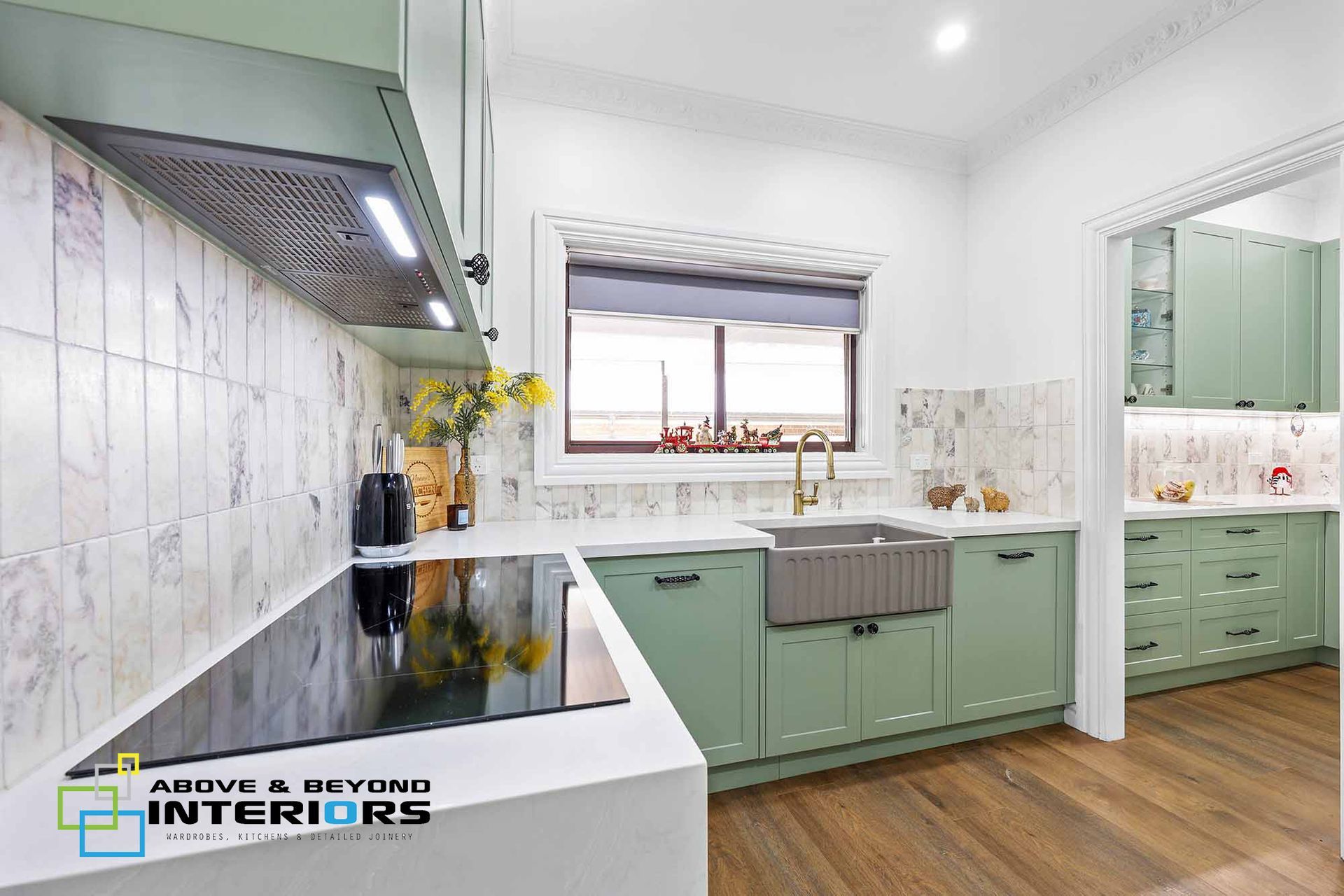 Mint Green Kitchen with White Marble Counters — Above & Beyond Interiors in Smeaton Grange, NSW