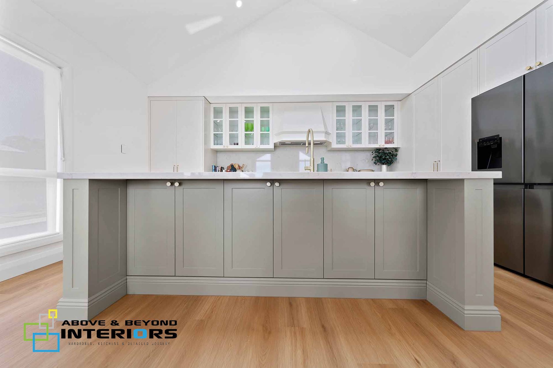 Modern Gray Kitchen with White Countertops — Above & Beyond Interiors in Smeaton Grange, NSW