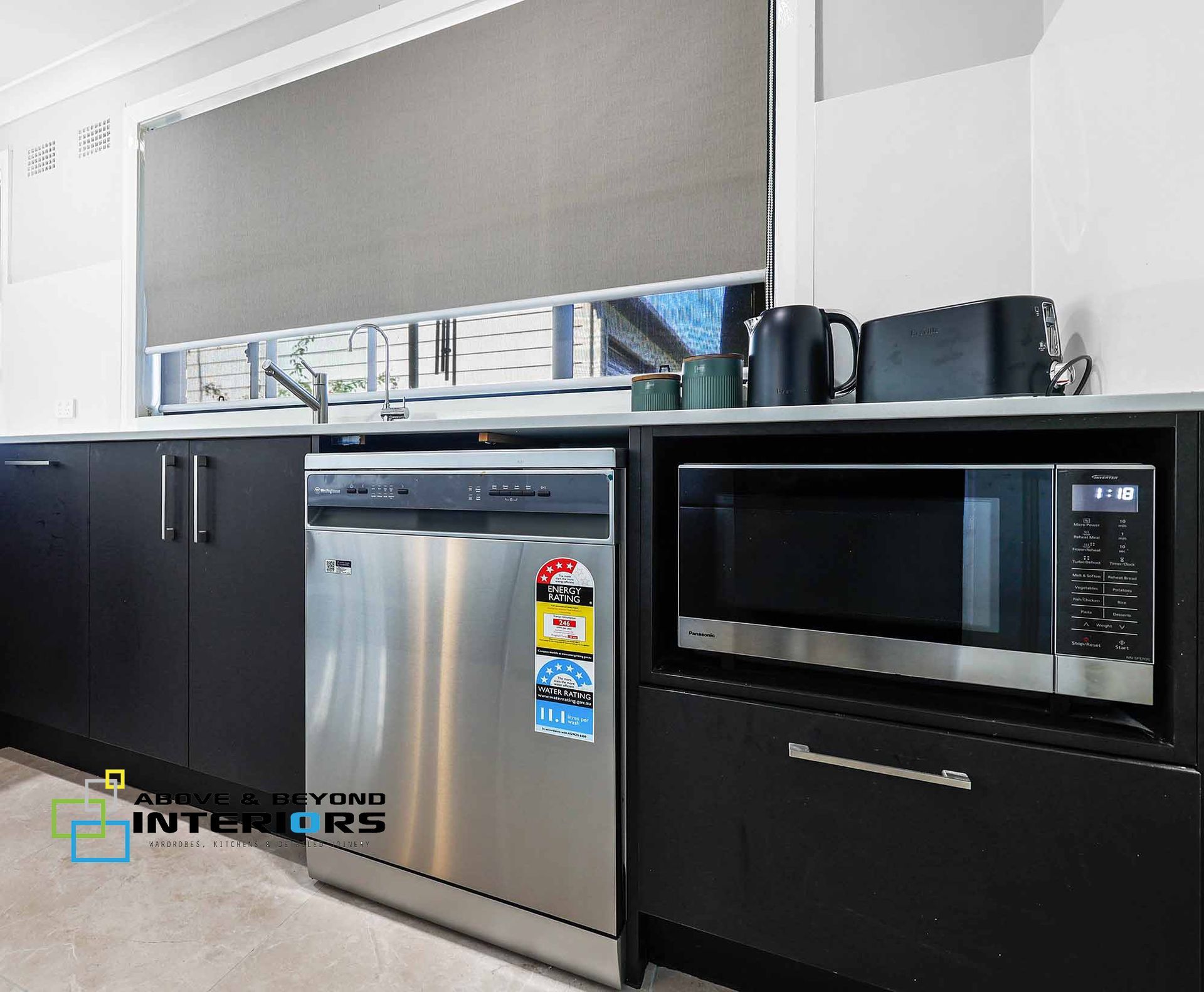 Modern Kitchen Counter with Stainless Dishwasher — Above & Beyond Interiors in Smeaton Grange, NSW