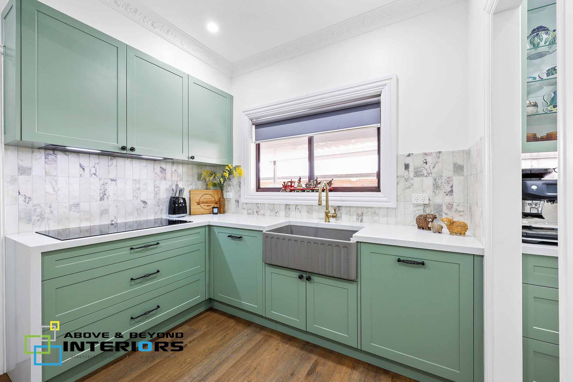 Mint-Green Kitchen Cabinets and White Countertops — Above & Beyond Interiors in Smeaton Grange, NSW