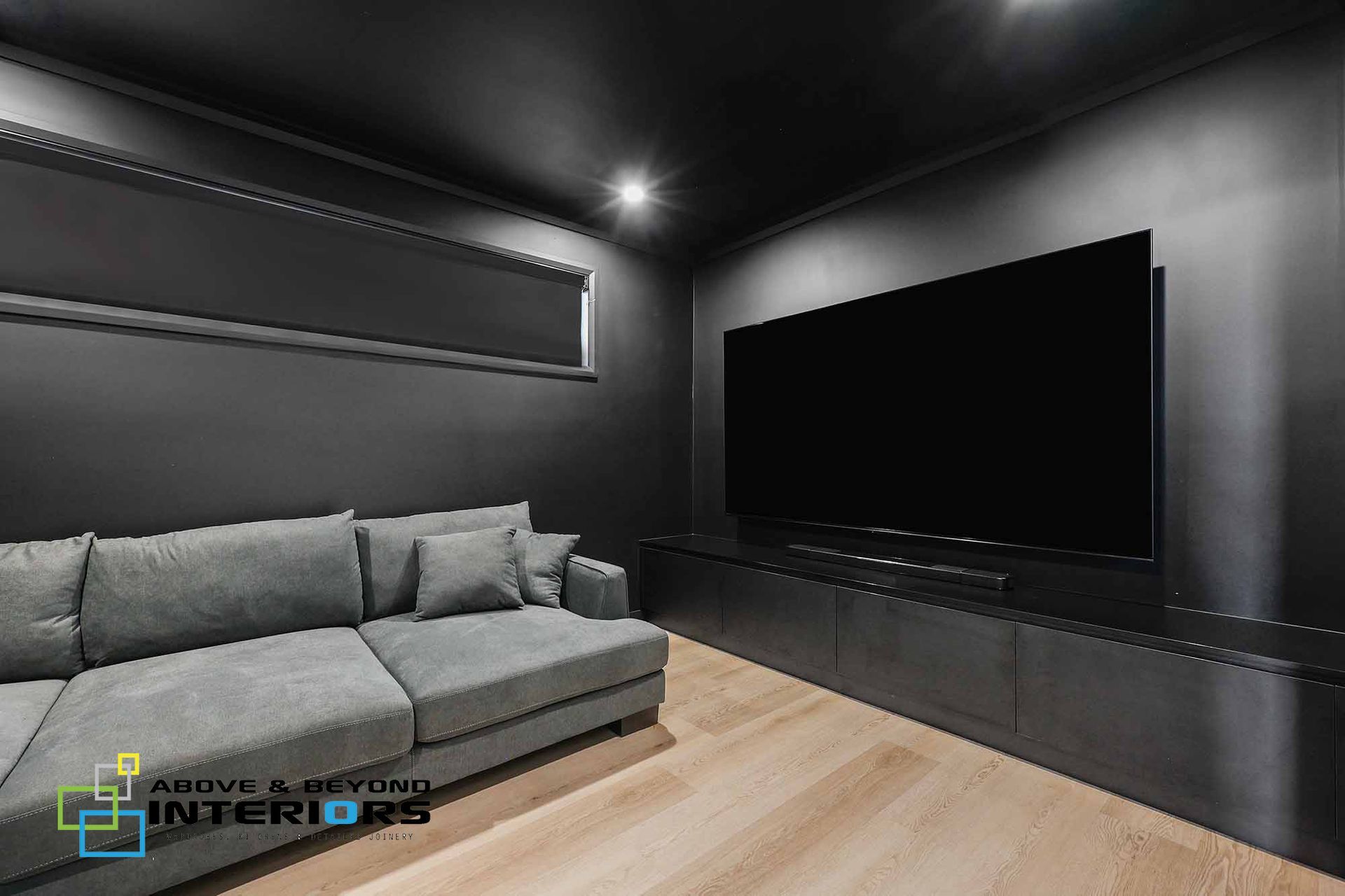 Modern Living Room with Gray Sofa — Above & Beyond Interiors in Smeaton Grange, NSW