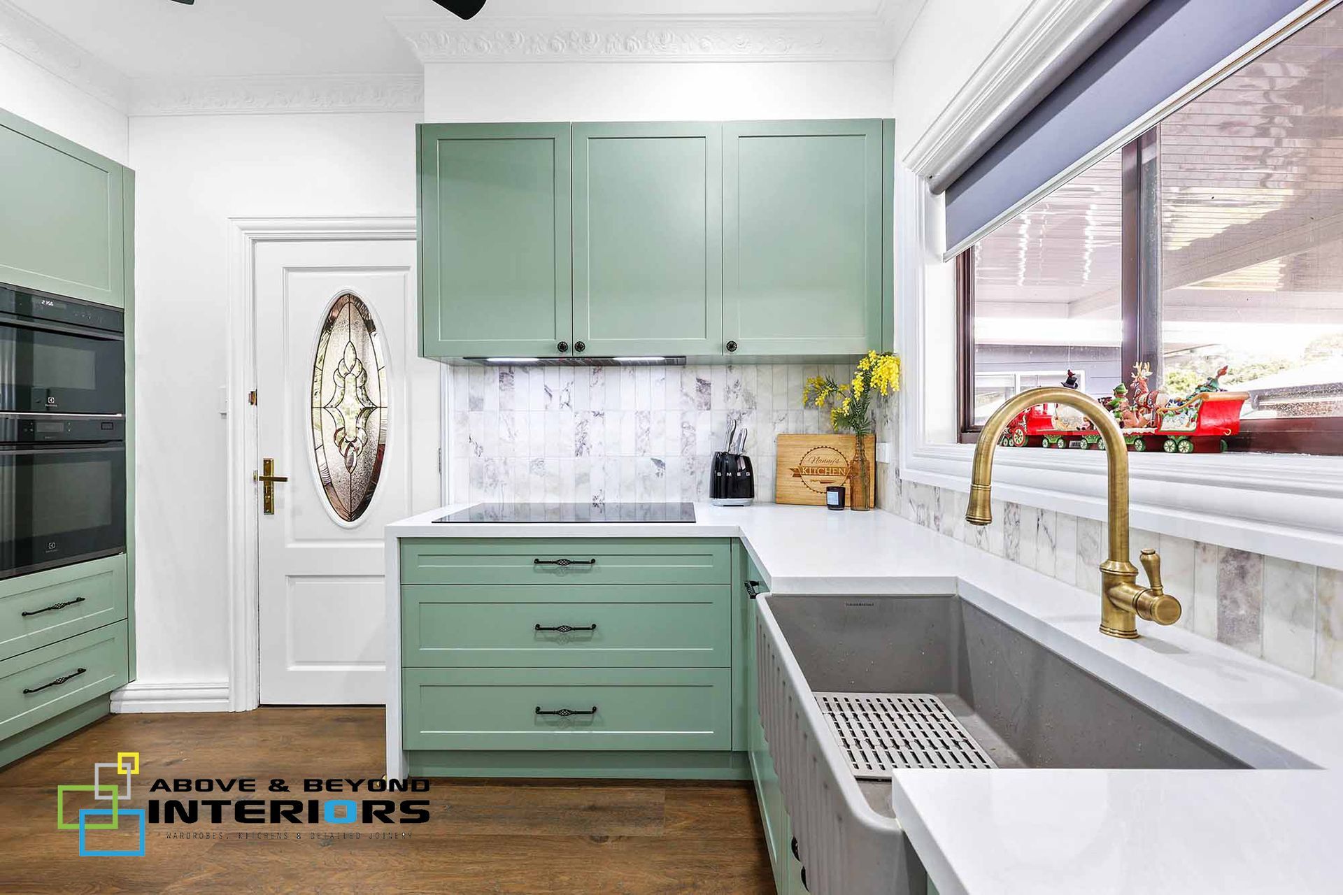 Mint-Green Kitchen with Brass Faucet — Above & Beyond Interiors in Smeaton Grange, NSW