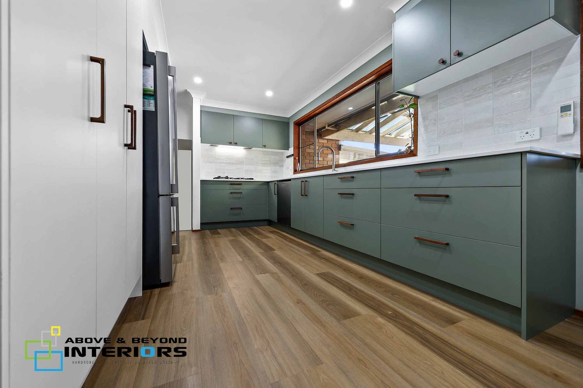 Modern Kitchen with Floors, and White Countertops — Above & Beyond Interiors in Smeaton Grange, NSW