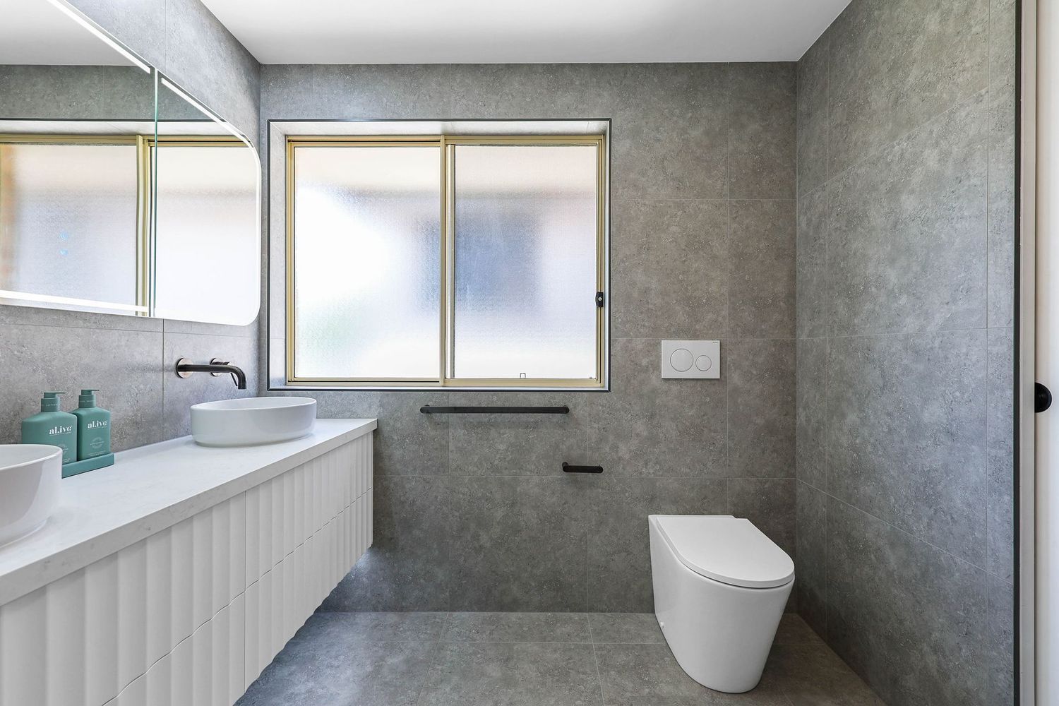 Modern Gray Bathroom With Vanity, Mirror — Above & Beyond Interiors in Smeaton Grange, NSW