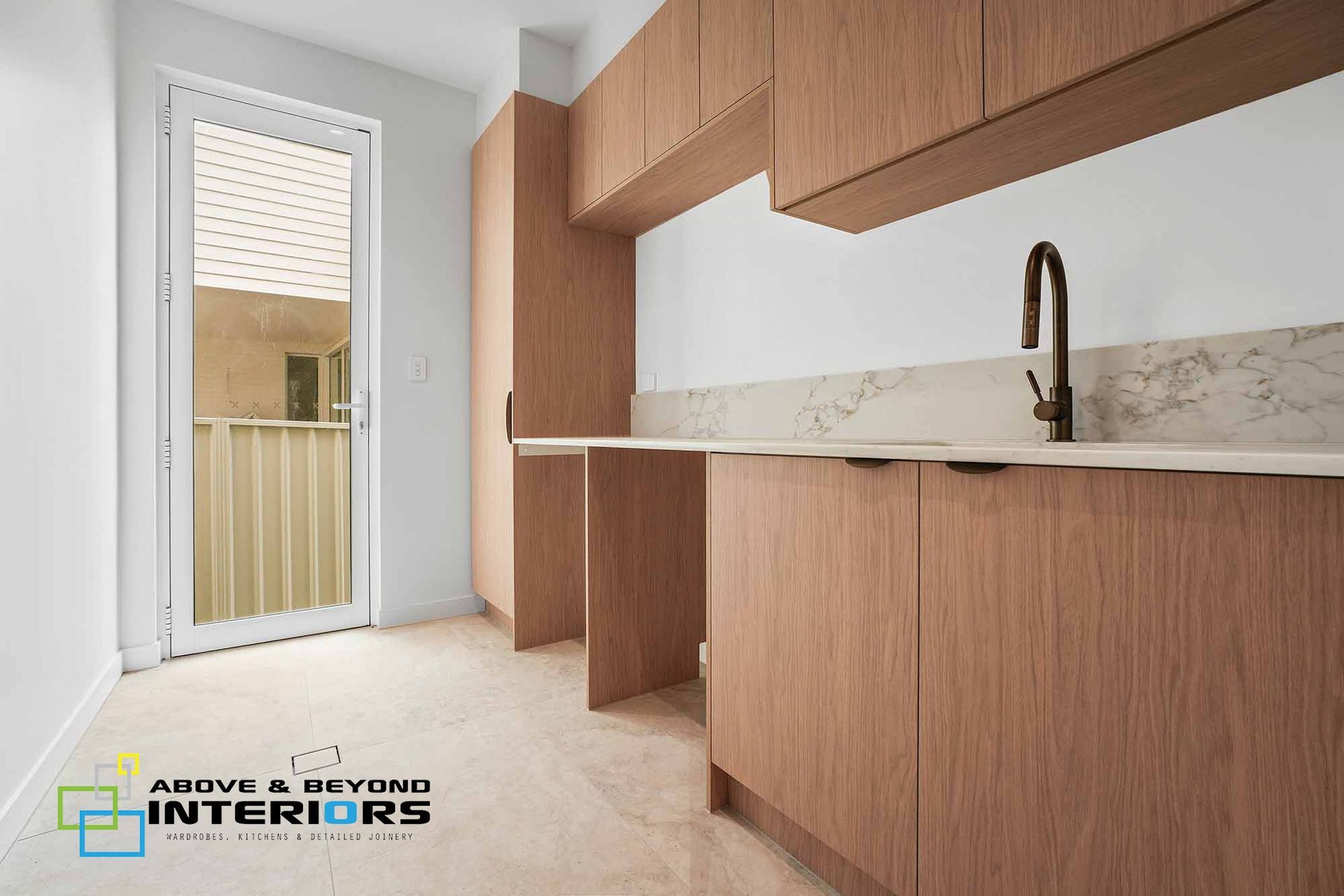 Modern Kitchen with Marble Backsplash, and A Door to A Balcony — Above & Beyond Interiors in Smeaton Grange, NSW
