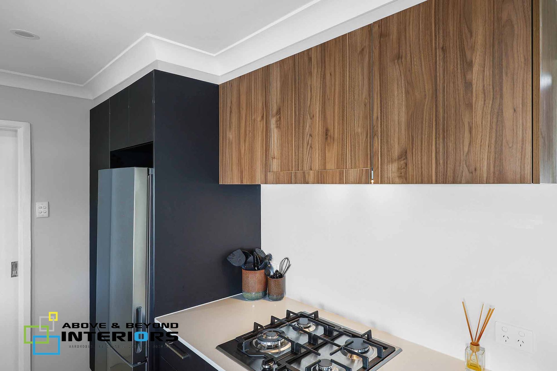 Modern Kitchen with Wood Cabinets — Above & Beyond Interiors in Smeaton Grange, NSW