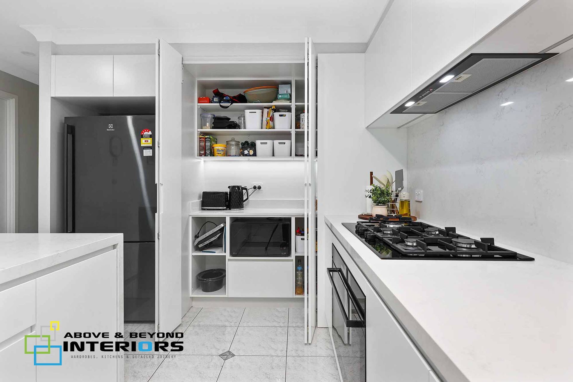 Modern White Galley Kitchen with Open Shelving — Above & Beyond Interiors in Smeaton Grange, NSW