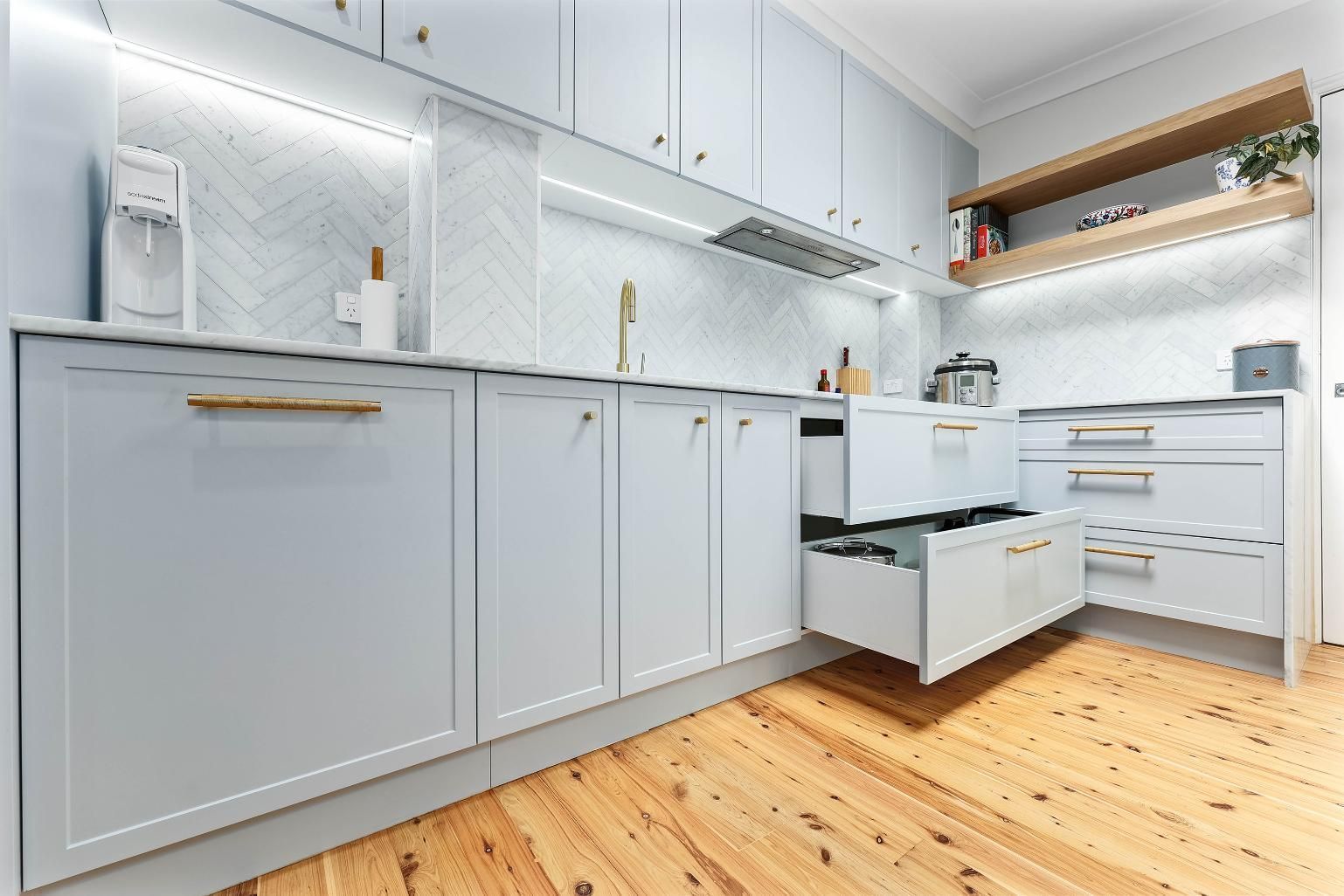 Bright Modern White Kitchen With Built-in Cabinets — Above & Beyond Interiors in Smeaton Grange, NSW
