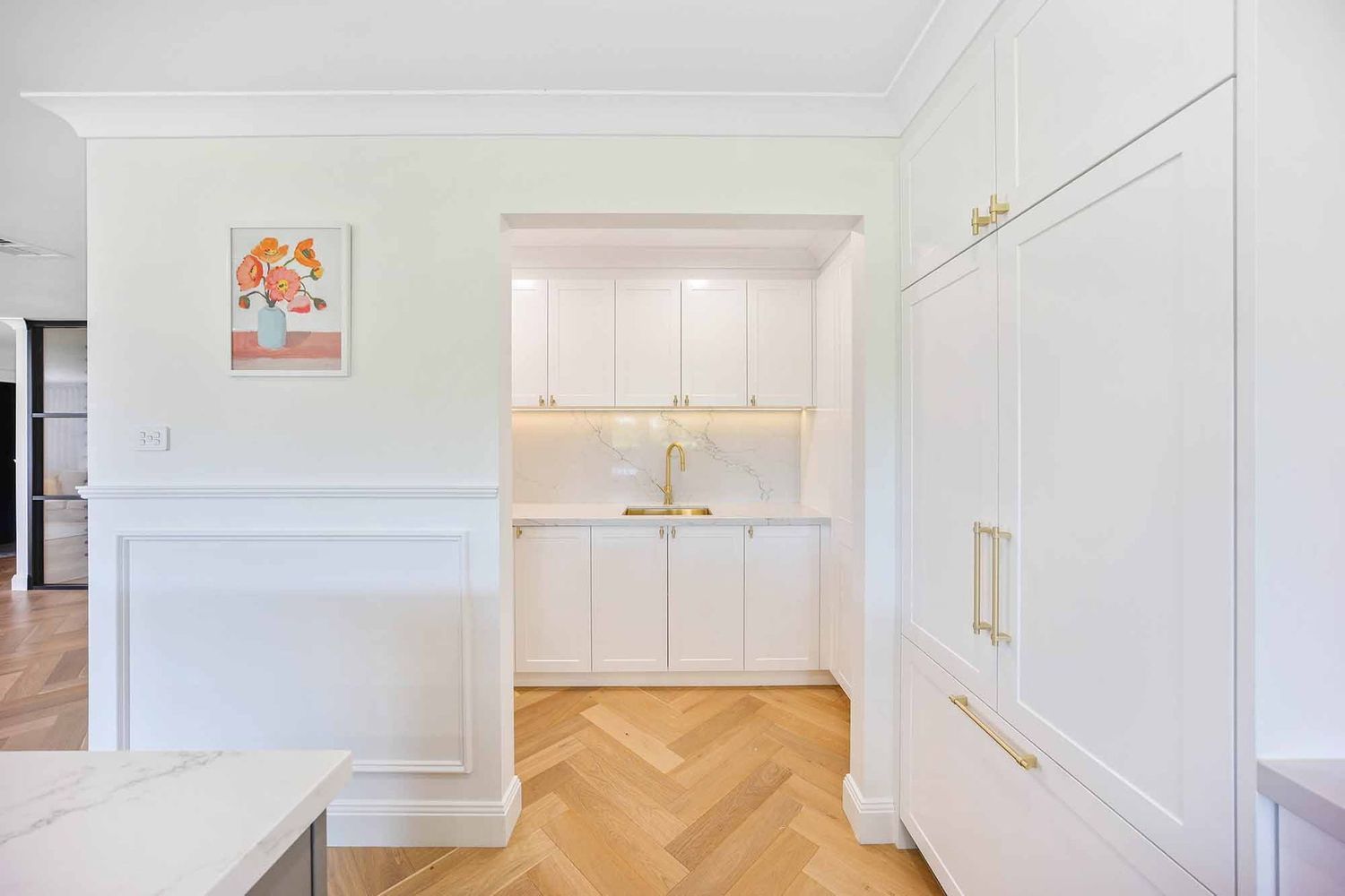 Bright White Room With Built-in Cabinets — Above & Beyond Interiors in Smeaton Grange, NSW