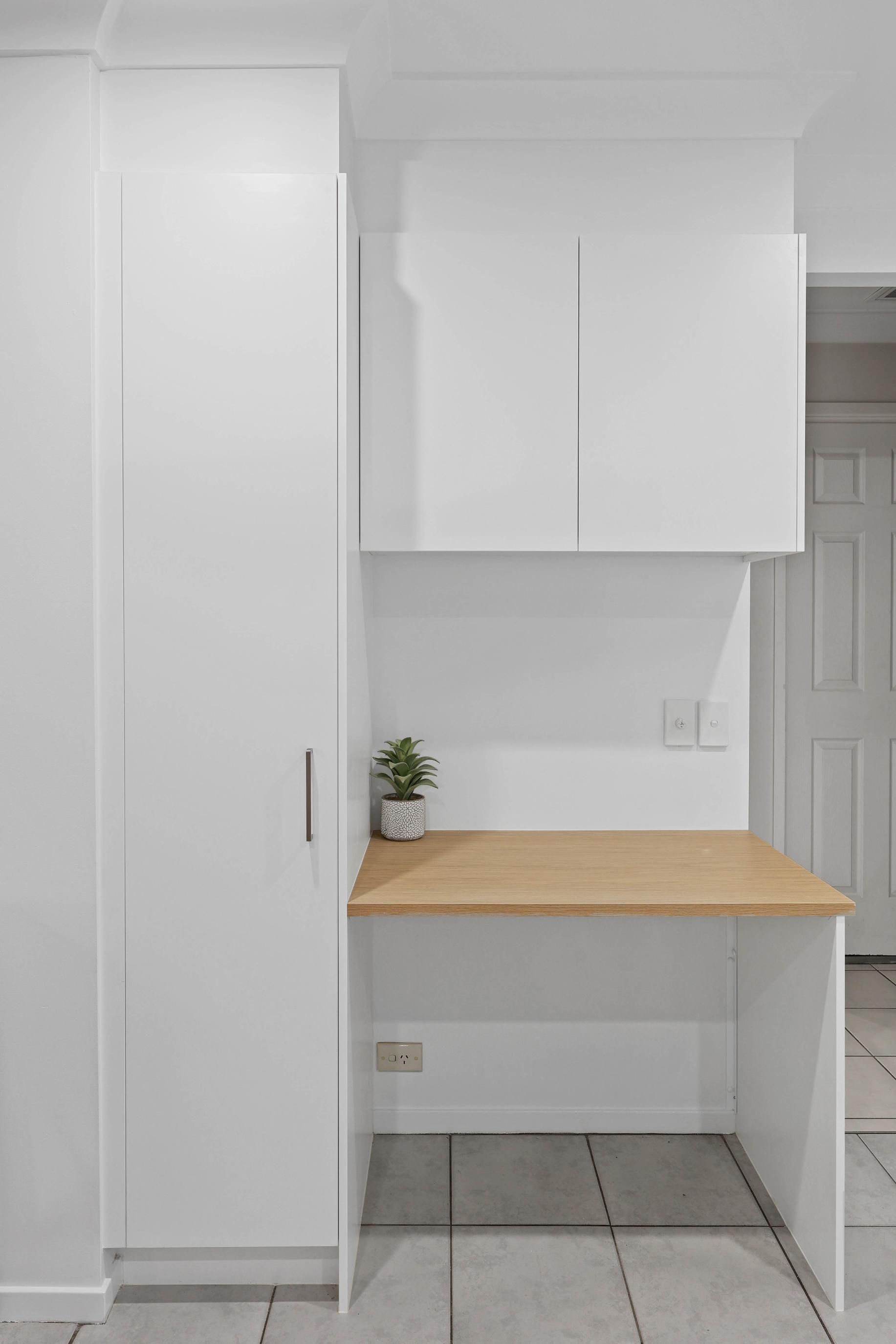 White Utility Nook With Tall Cabinet, Wall Cabinets — Above & Beyond Interiors in Smeaton Grange, NSW