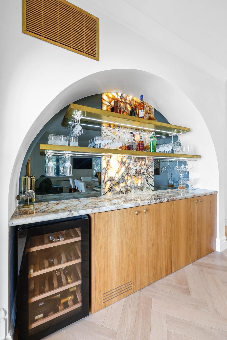 Modern Bar Cabinet With Arched White Niche, Wooden Cabinets — Above & Beyond Interiors in Smeaton Grange, NSW