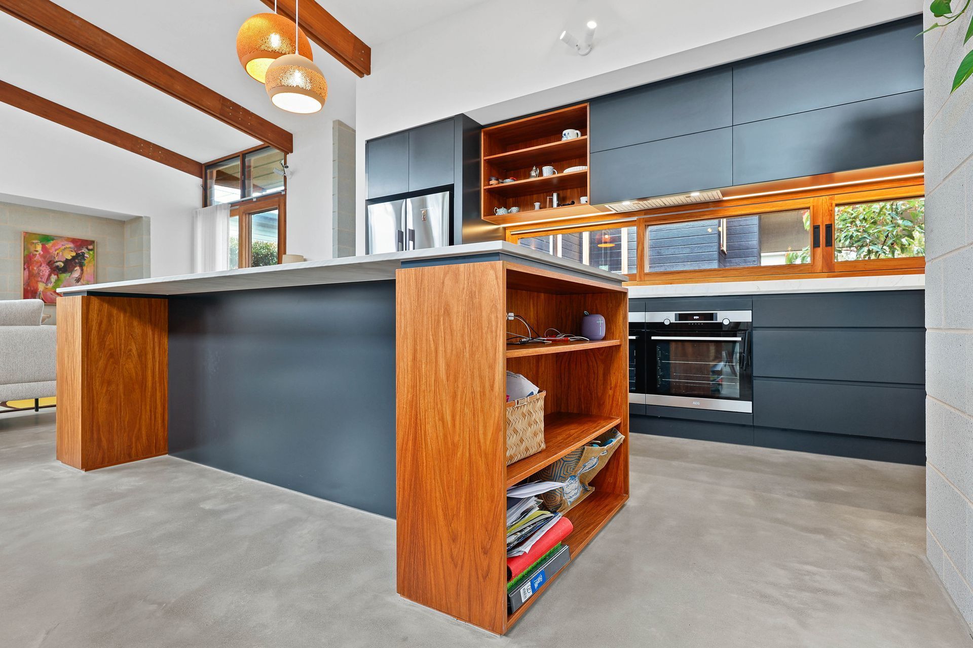 Modern Kitchen With Wood-and-gray Island — Above & Beyond Interiors in Smeaton Grange, NSW