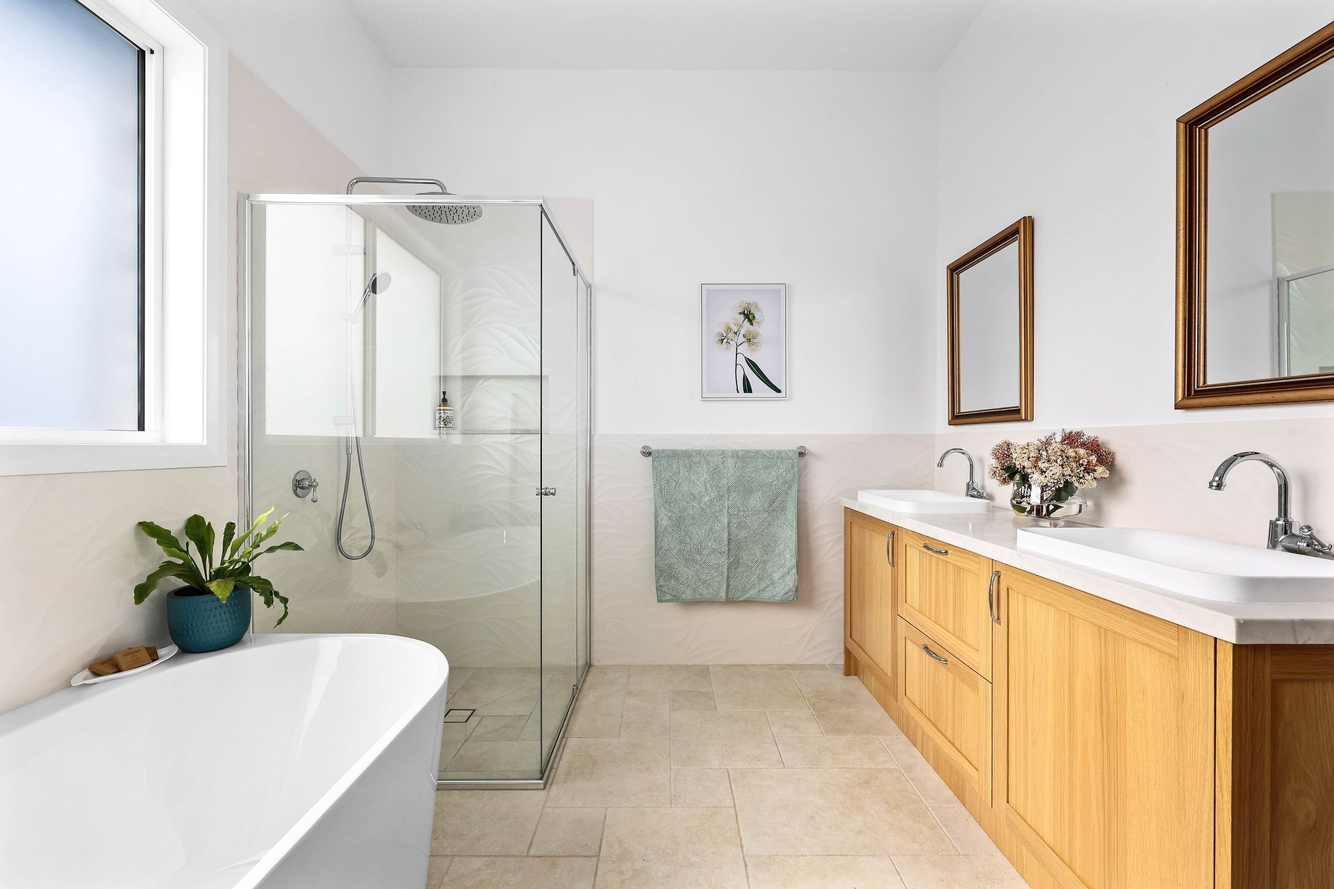 Bright Modern Bathroom With a Glass Shower — Above & Beyond Interiors in Smeaton Grange, NSW