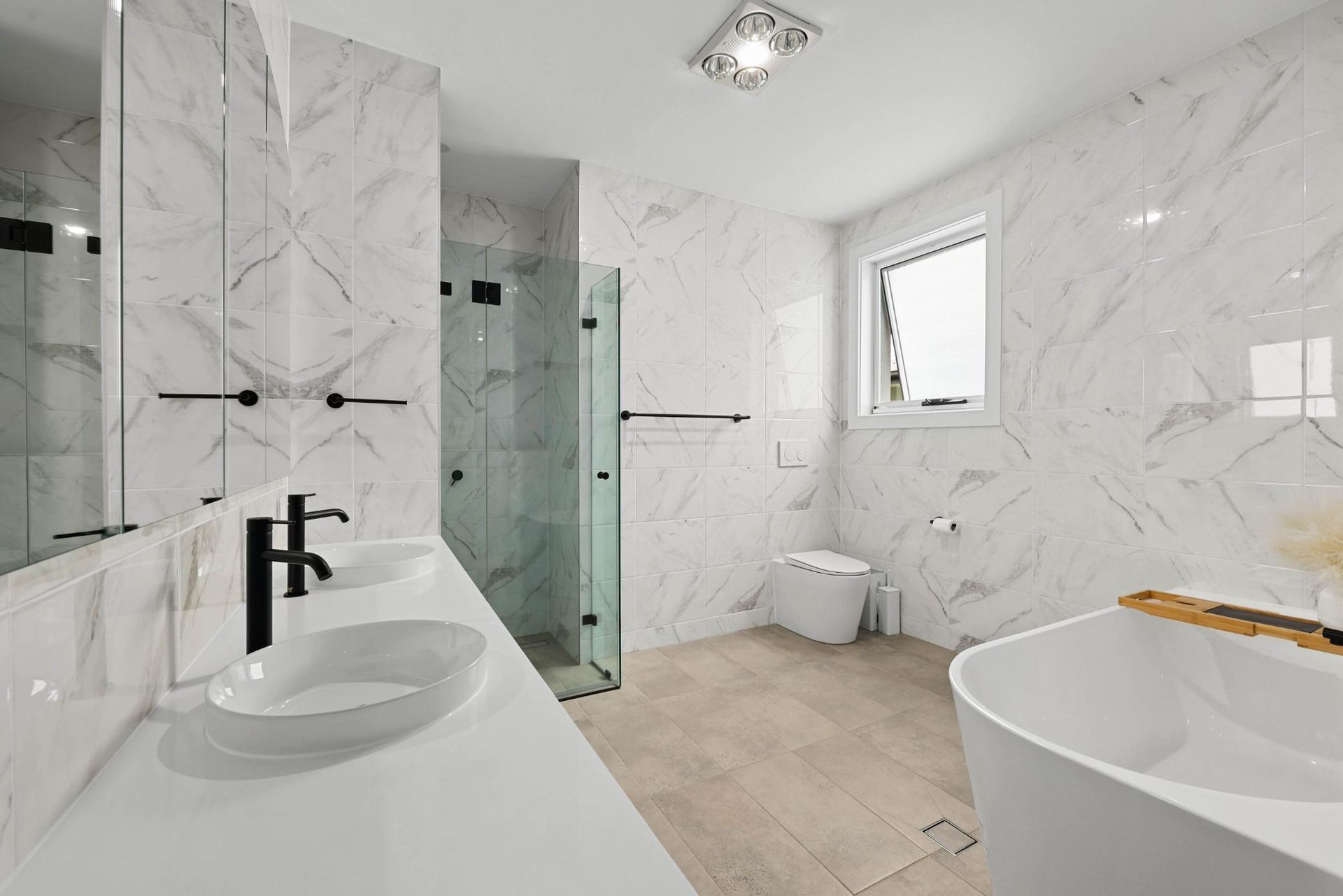 Modern White Bathroom With Marble Walls — Above & Beyond Interiors in Smeaton Grange, NSW