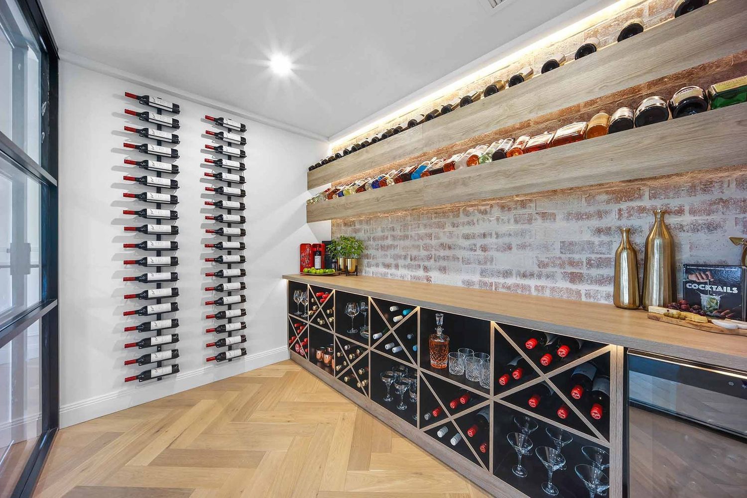 Modern Wine Cellar With Wall-mounted Racks — Above & Beyond Interiors in Smeaton Grange, NSW