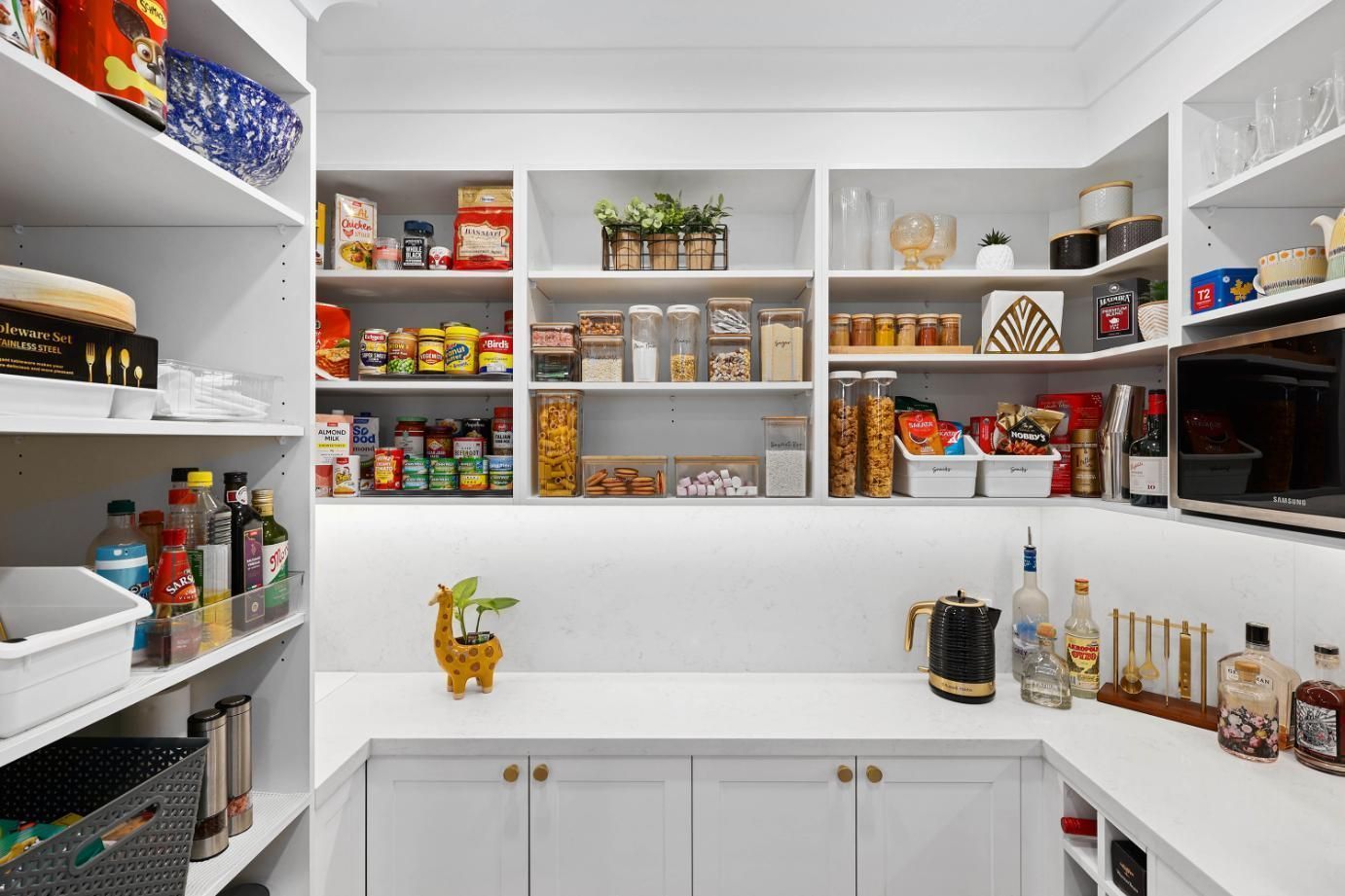 Bright White Pantry With Open Shelves — Above & Beyond Interiors in Smeaton Grange, NSW