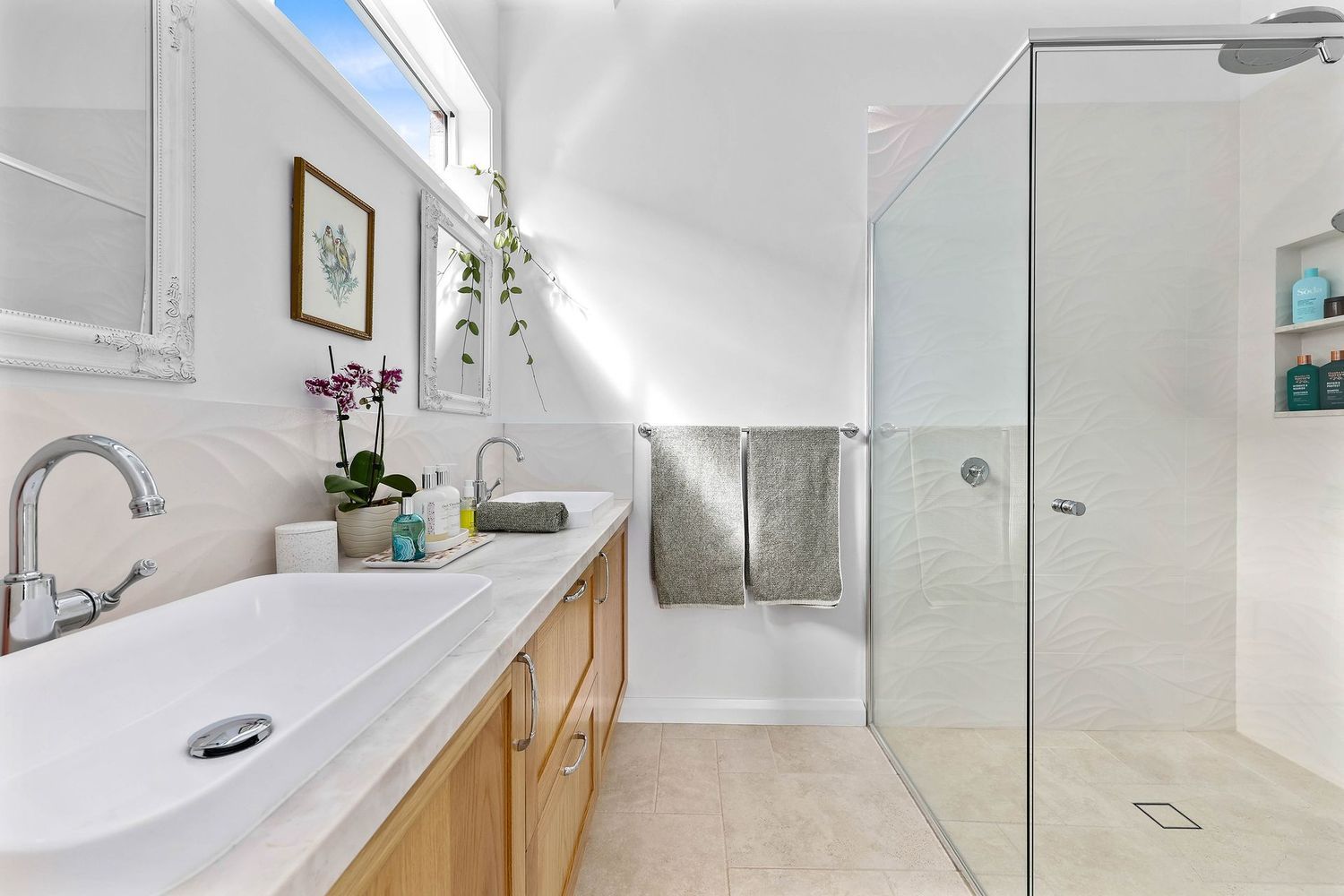 Bright, Modern Bathroom With Double Sinks — Above & Beyond Interiors in Smeaton Grange, NSW