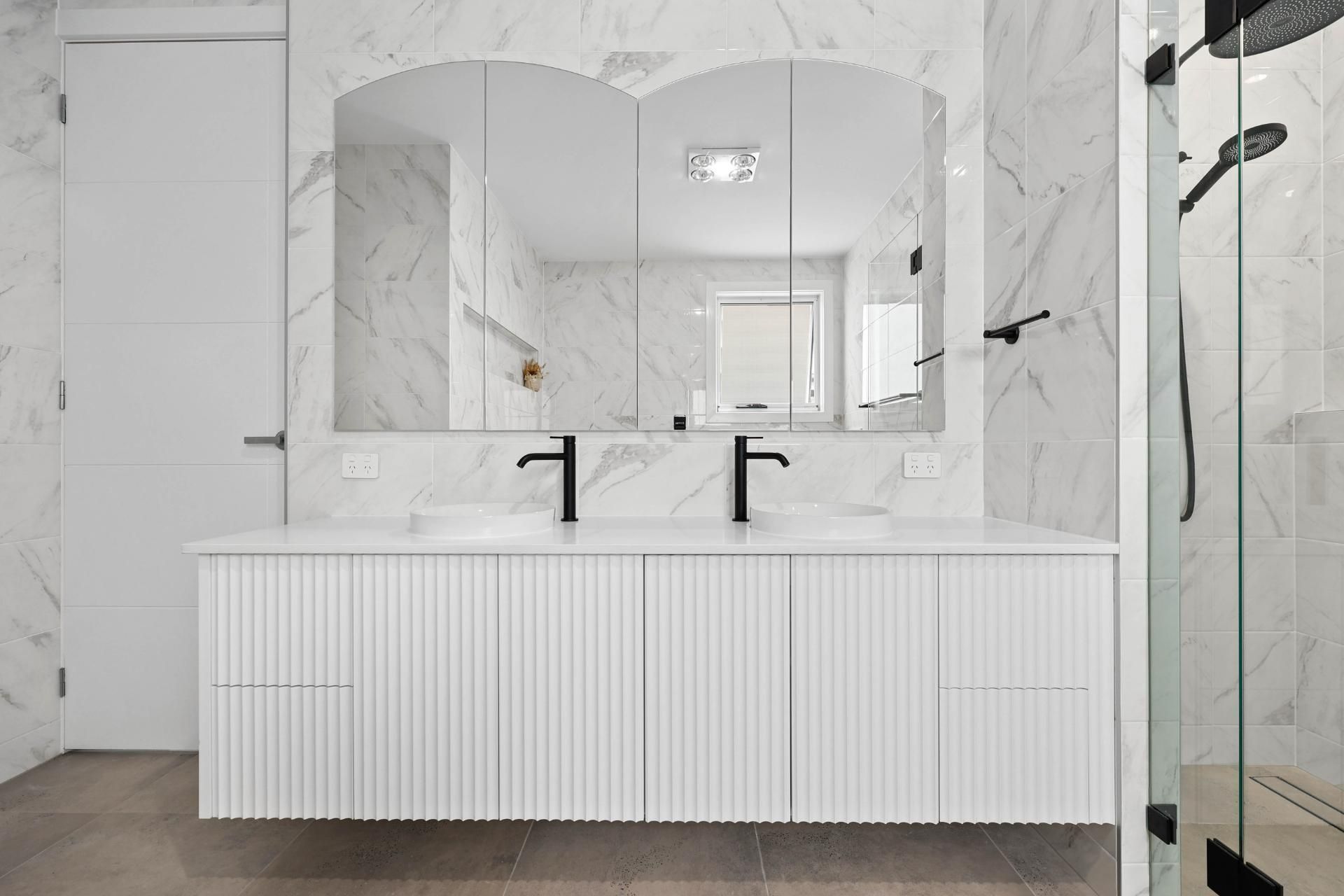Modern White Bathroom With Double Vanity — Above & Beyond Interiors in Smeaton Grange, NSW
