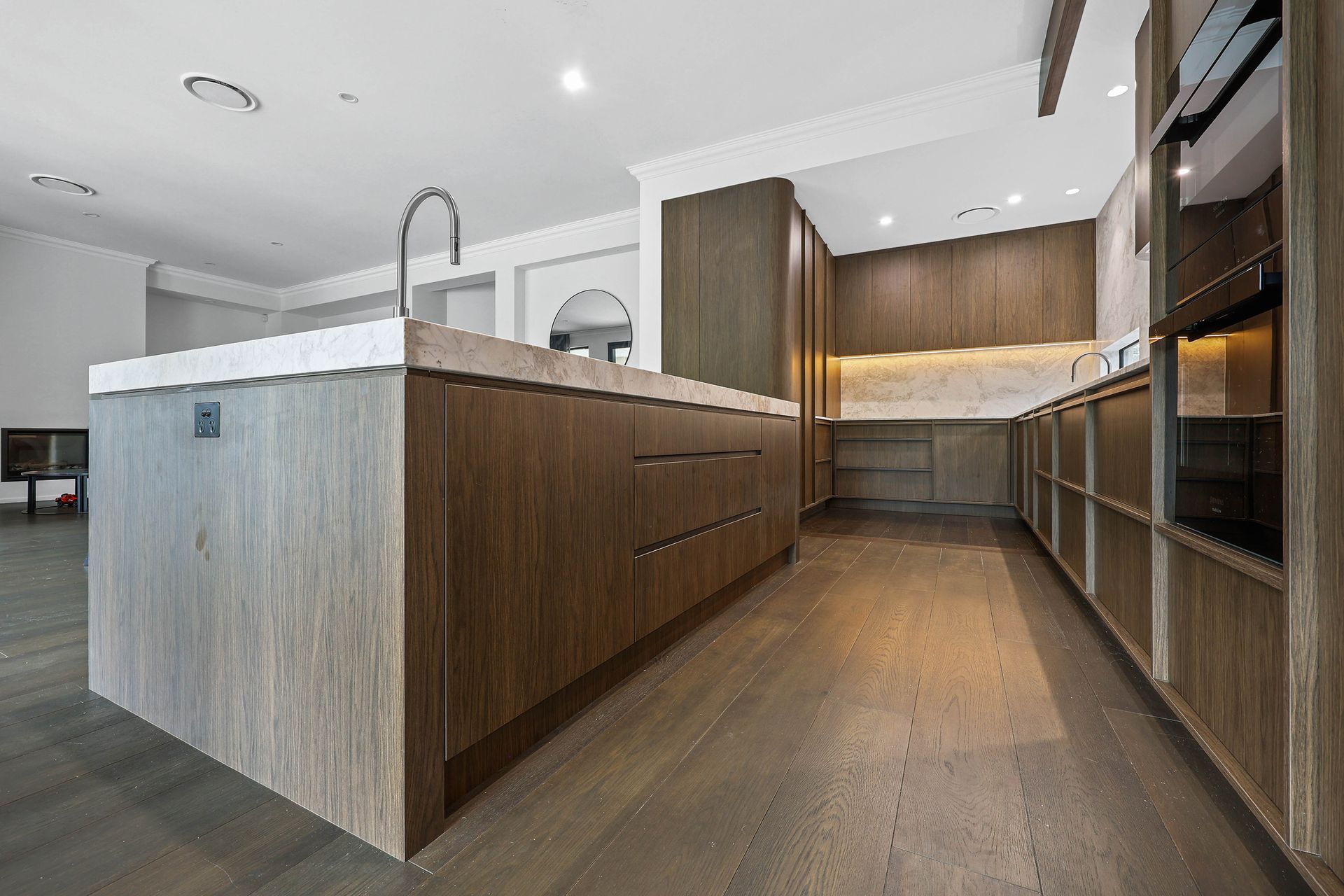 Modern Kitchen With Wood Cabinets, Island Sink — Above & Beyond Interiors in Smeaton Grange, NSW