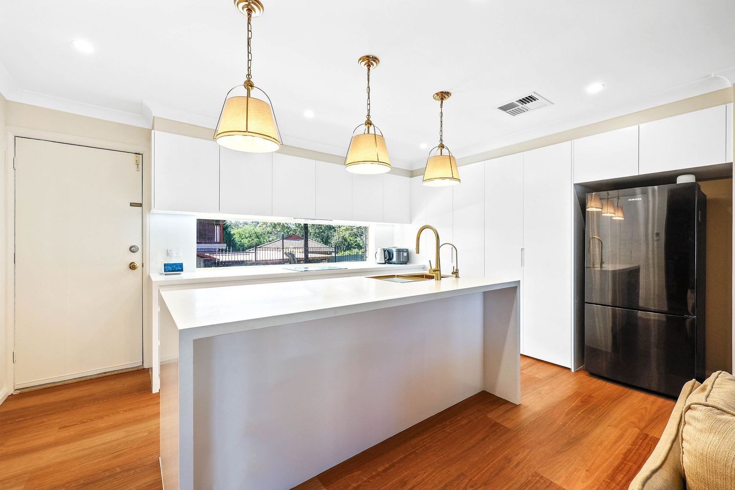 Bright Modern Kitchen With White Island — Above & Beyond Interiors in Smeaton Grange, NSW
