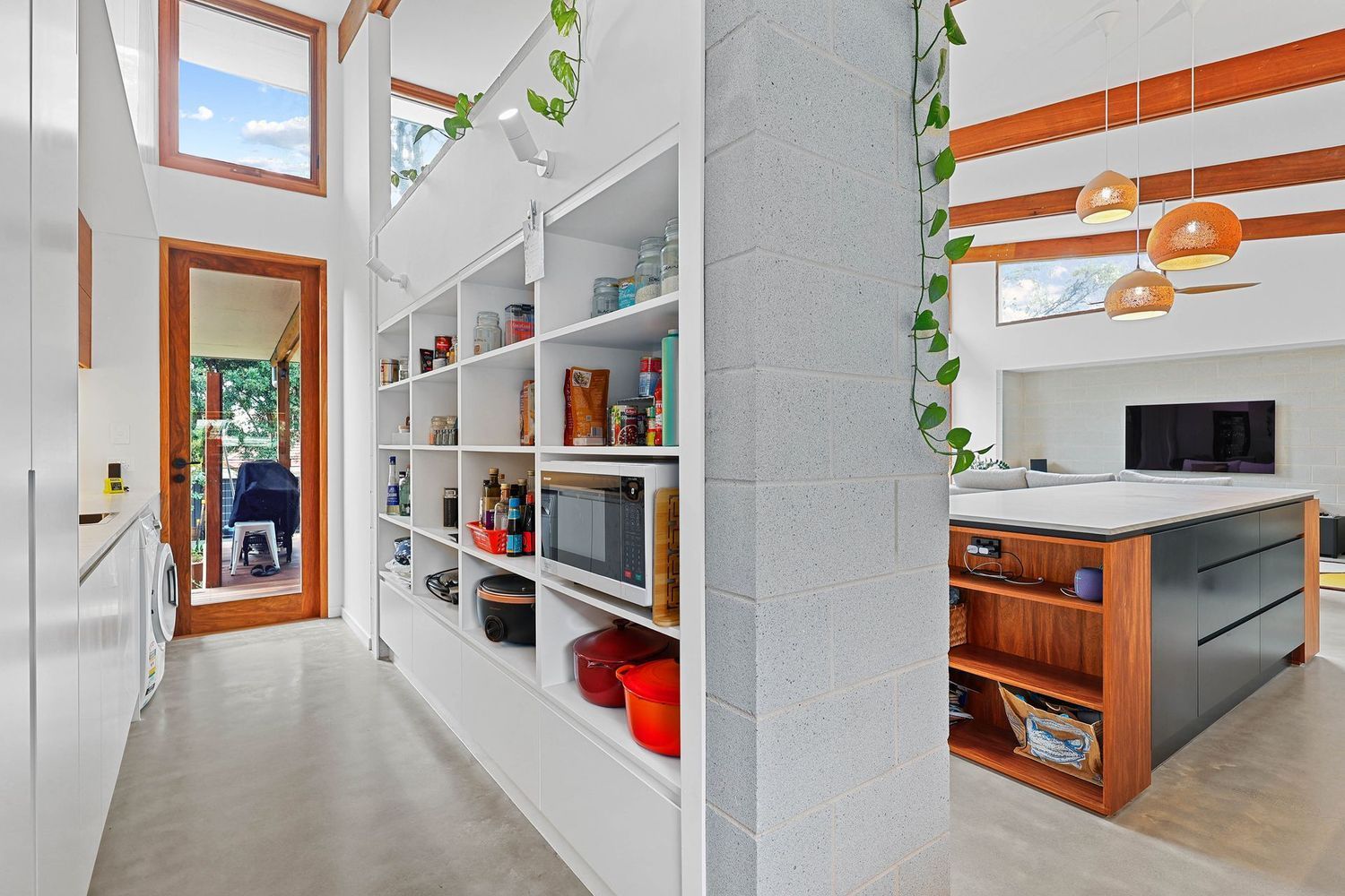 Bright Hallway With Open Shelving, Leading to a Modern Kitchen — Above & Beyond Interiors in Smeaton Grange, NSW