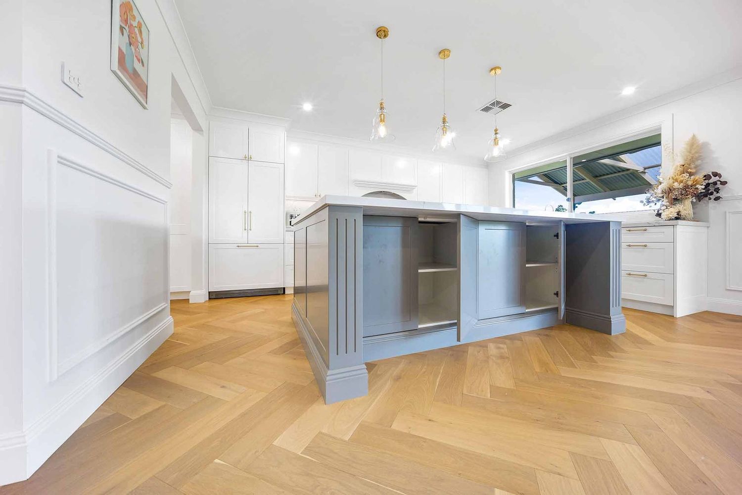 Bright Modern Kitchen With Blue Island — Above & Beyond Interiors in Smeaton Grange, NSW
