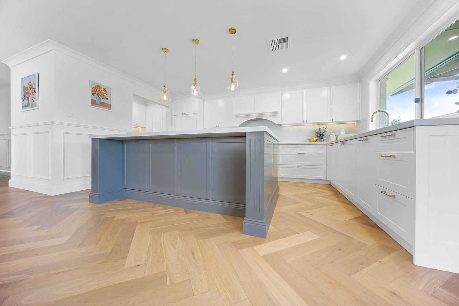 Bright Modern Kitchen With Blue Island — Above & Beyond Interiors in Smeaton Grange, NSW
