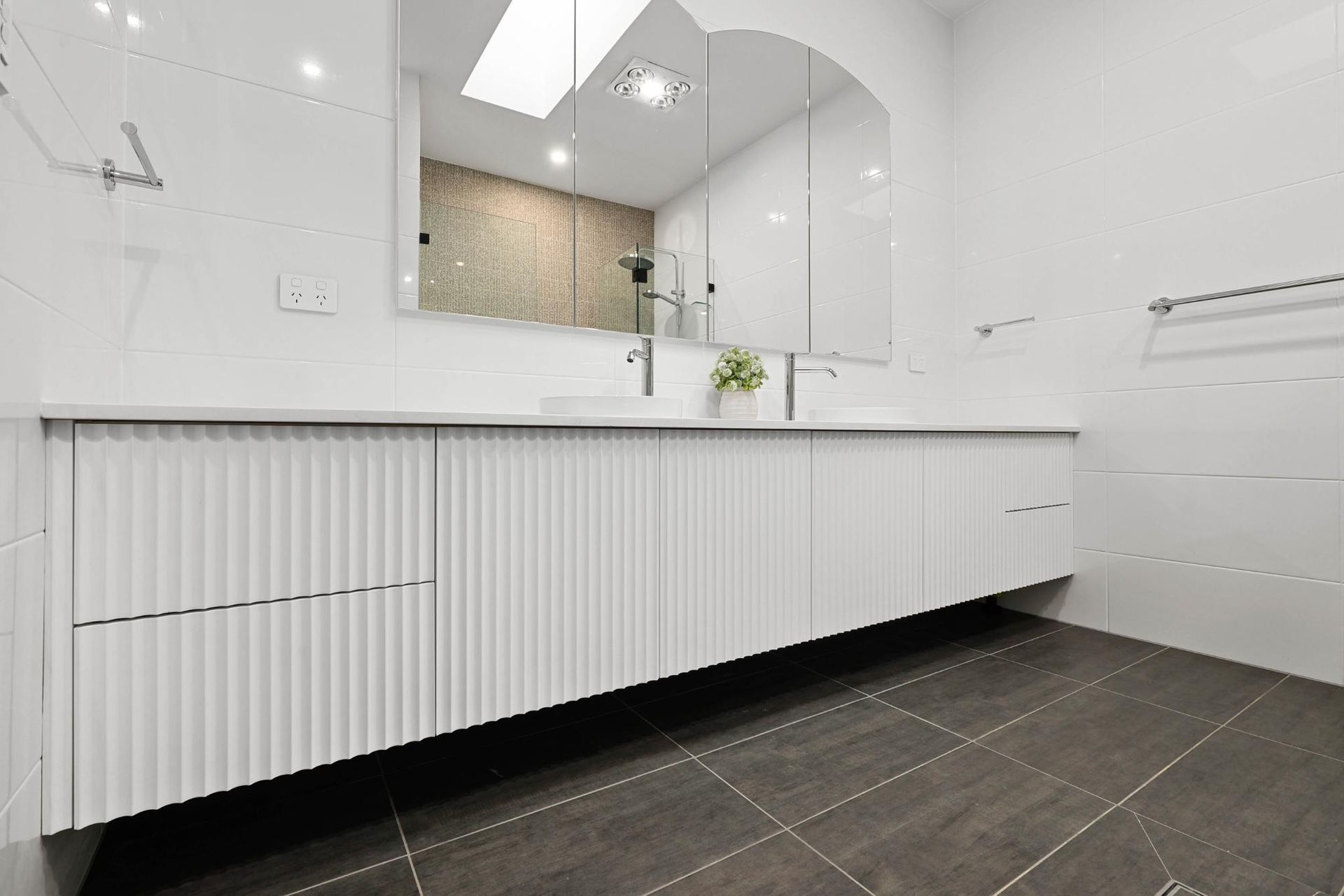Bright Modern White Bathroom With Long Vanity — Above & Beyond Interiors in Smeaton Grange, NSW
