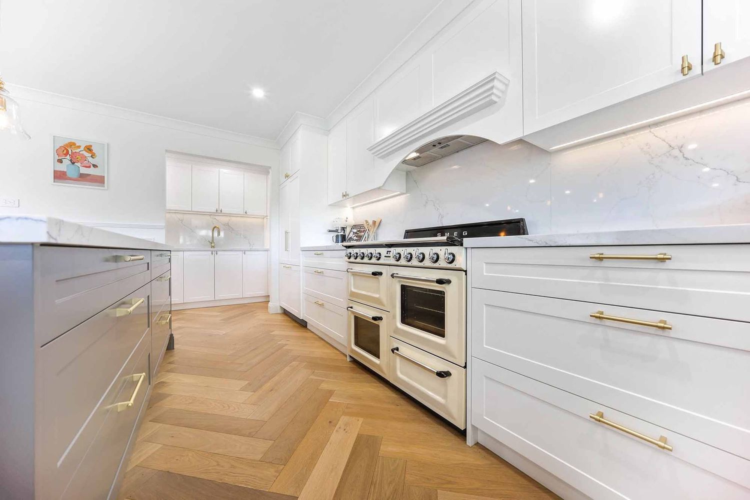 Bright White Modern Kitchen With Gold Accents — Above & Beyond Interiors in Smeaton Grange, NSW