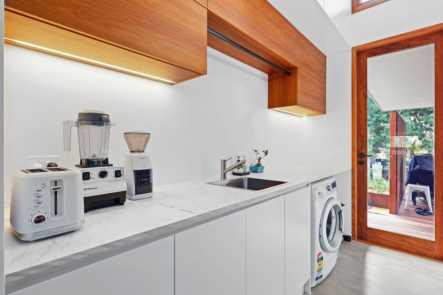 Bright Modern Kitchen With White Counters — Above & Beyond Interiors in Smeaton Grange, NSW